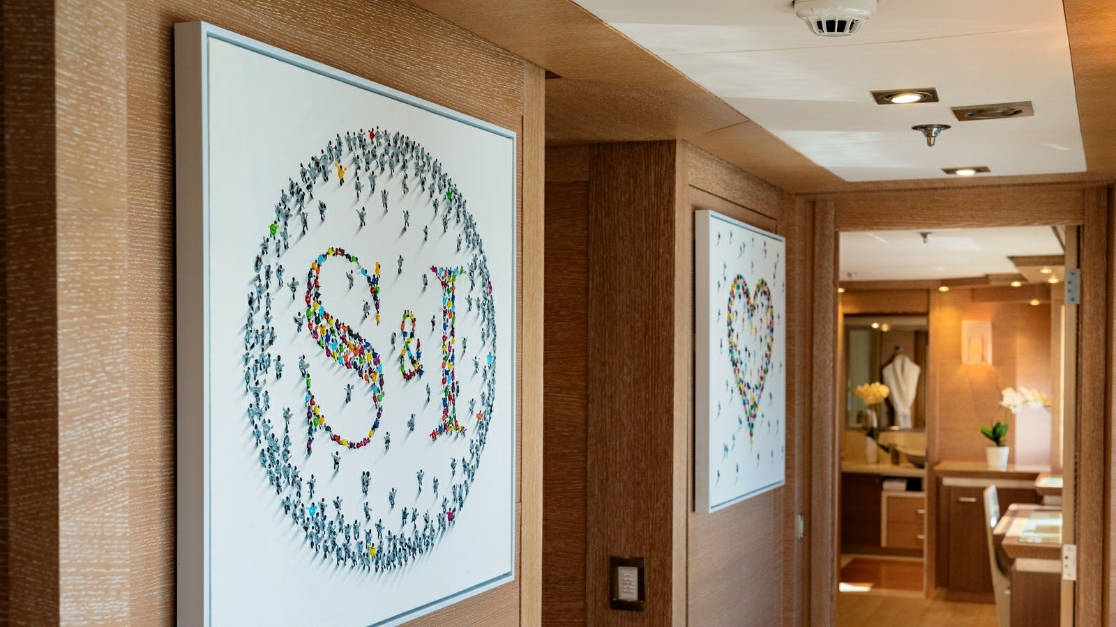 a room with a painting on the wall aboard NORMA JEAN Yacht for Charter