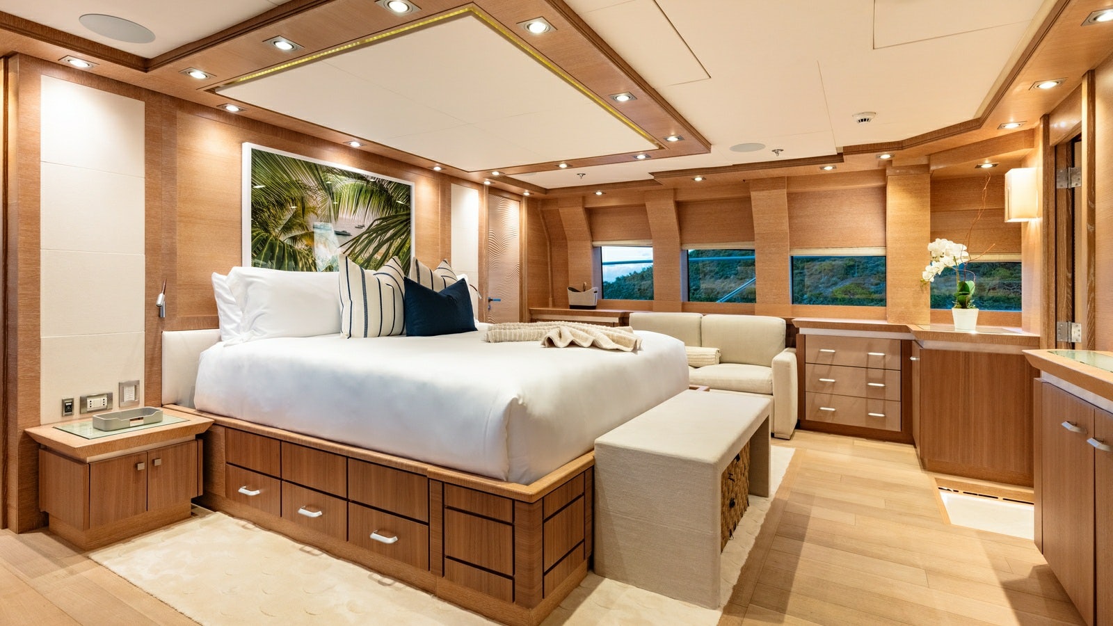 a room with a bed and a desk aboard NORMA JEAN Yacht for Charter