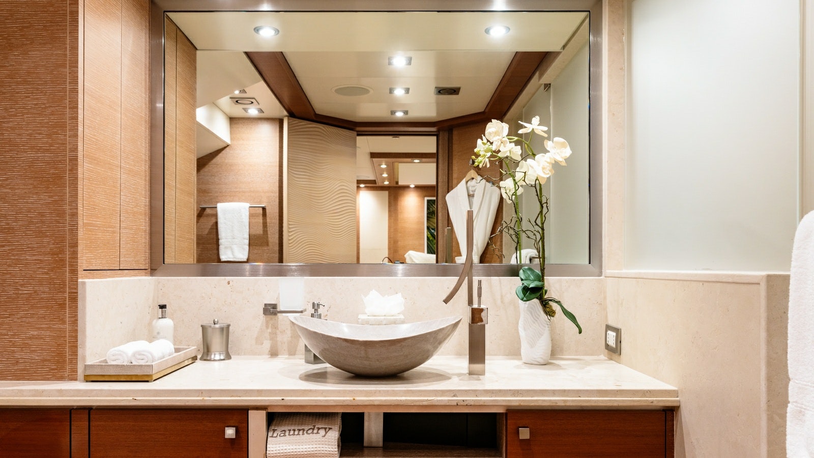 a bathroom with a large mirror aboard NORMA JEAN Yacht for Charter