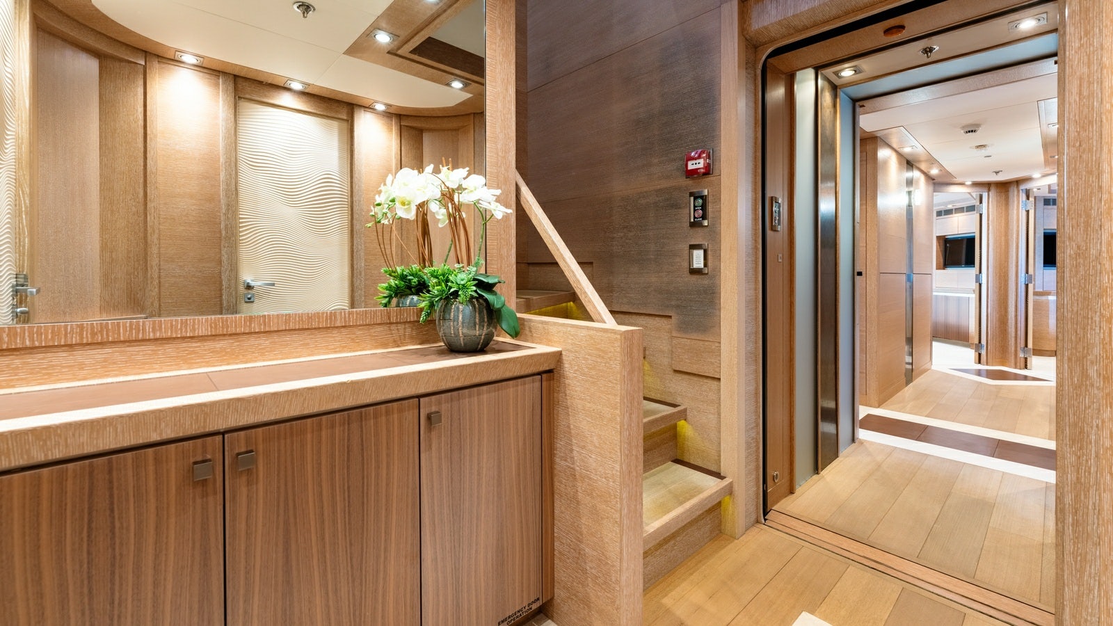 a large bathroom with a large mirror aboard NORMA JEAN Yacht for Charter
