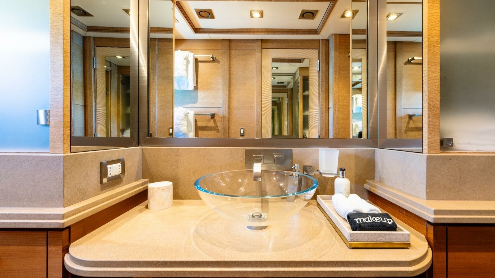 a large bathroom with a large round sink aboard NORMA JEAN Yacht for Charter