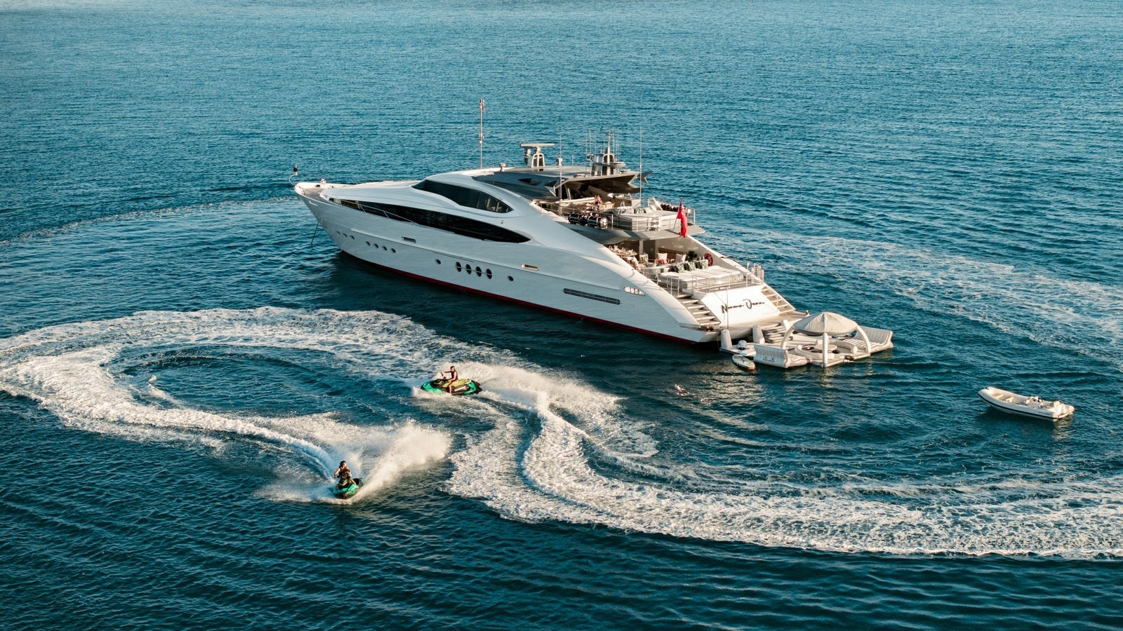a large white ship on the water aboard NORMA JEAN Yacht for Charter