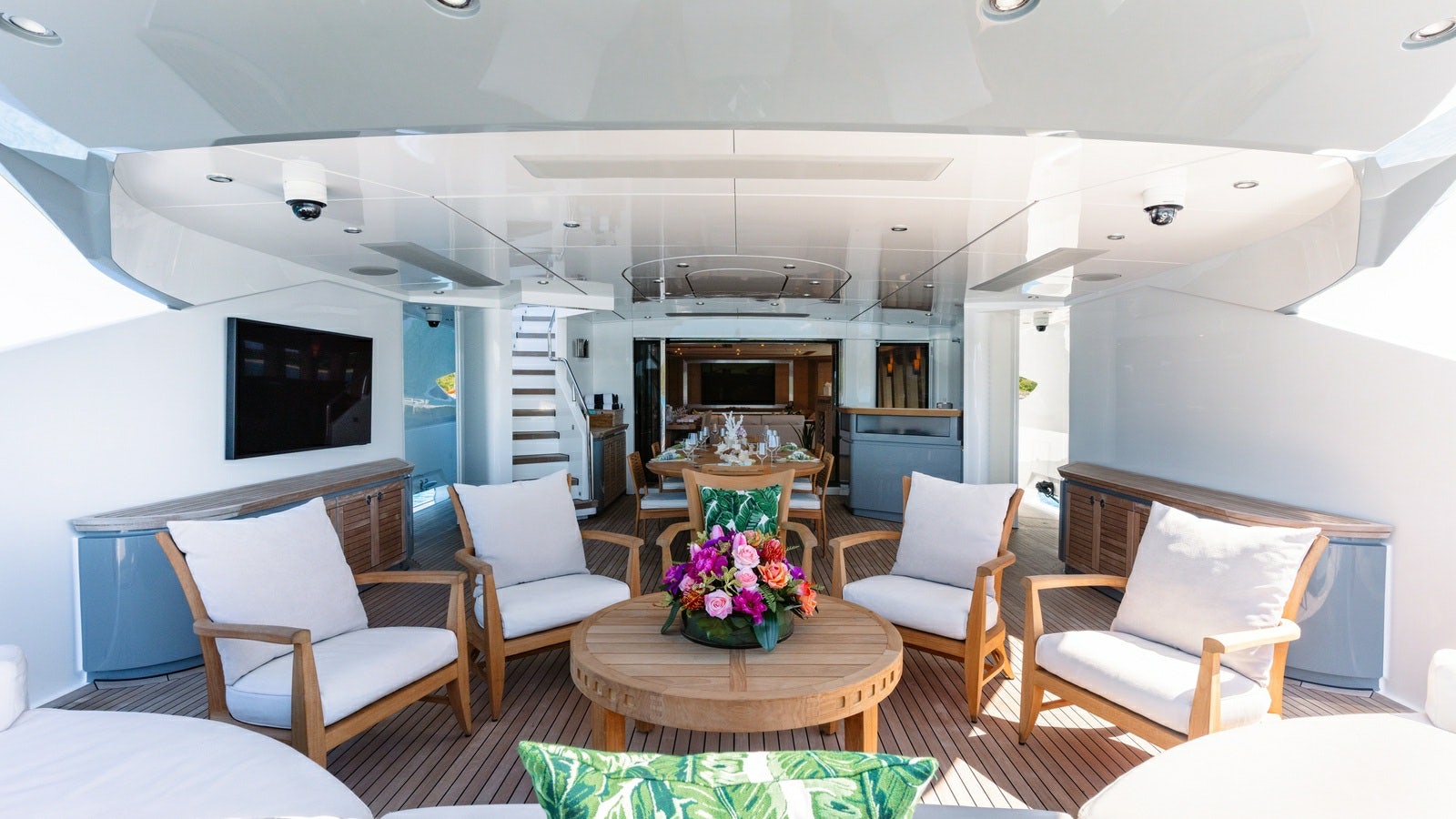 a living room with a table and chairs aboard NORMA JEAN Yacht for Charter