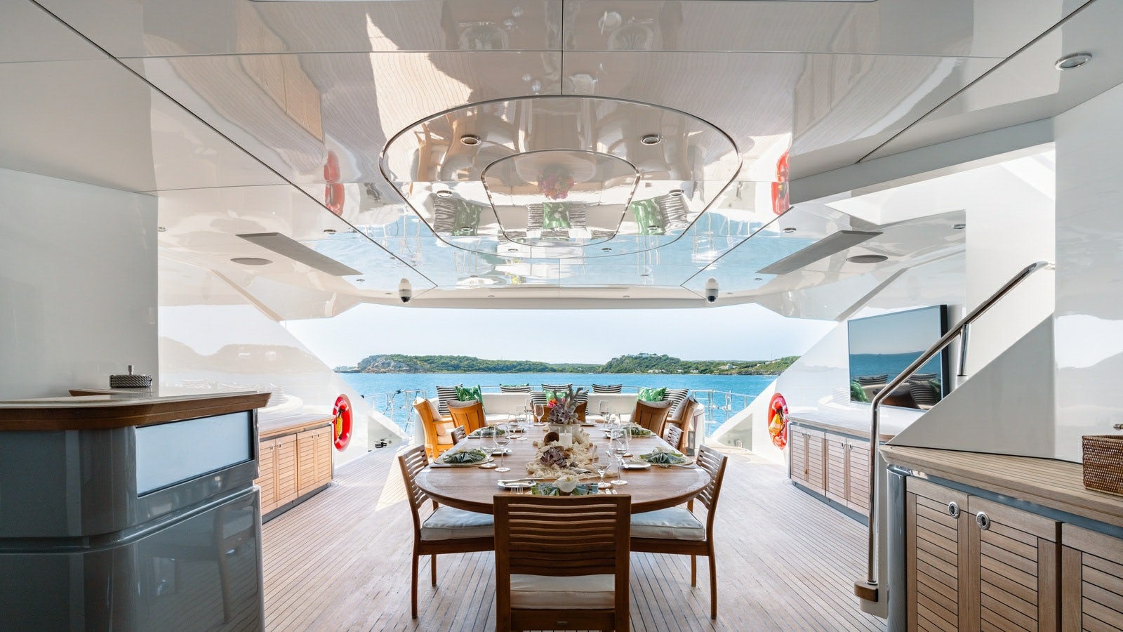 a room with a table and chairs aboard NORMA JEAN Yacht for Charter