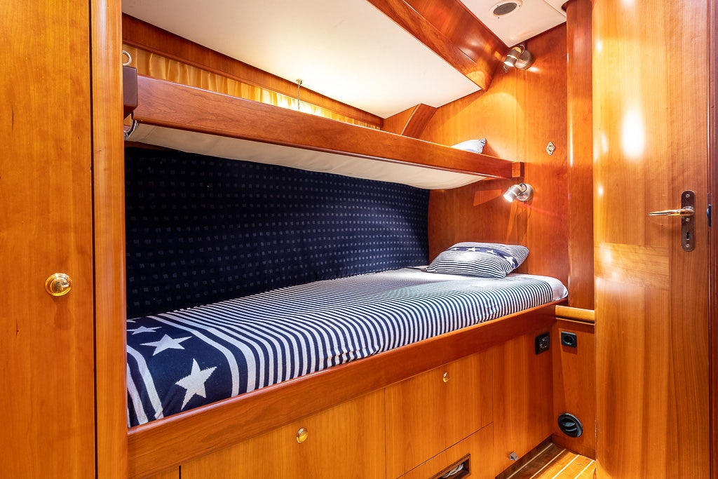 a bed in a room aboard JULIA Yacht for Sale