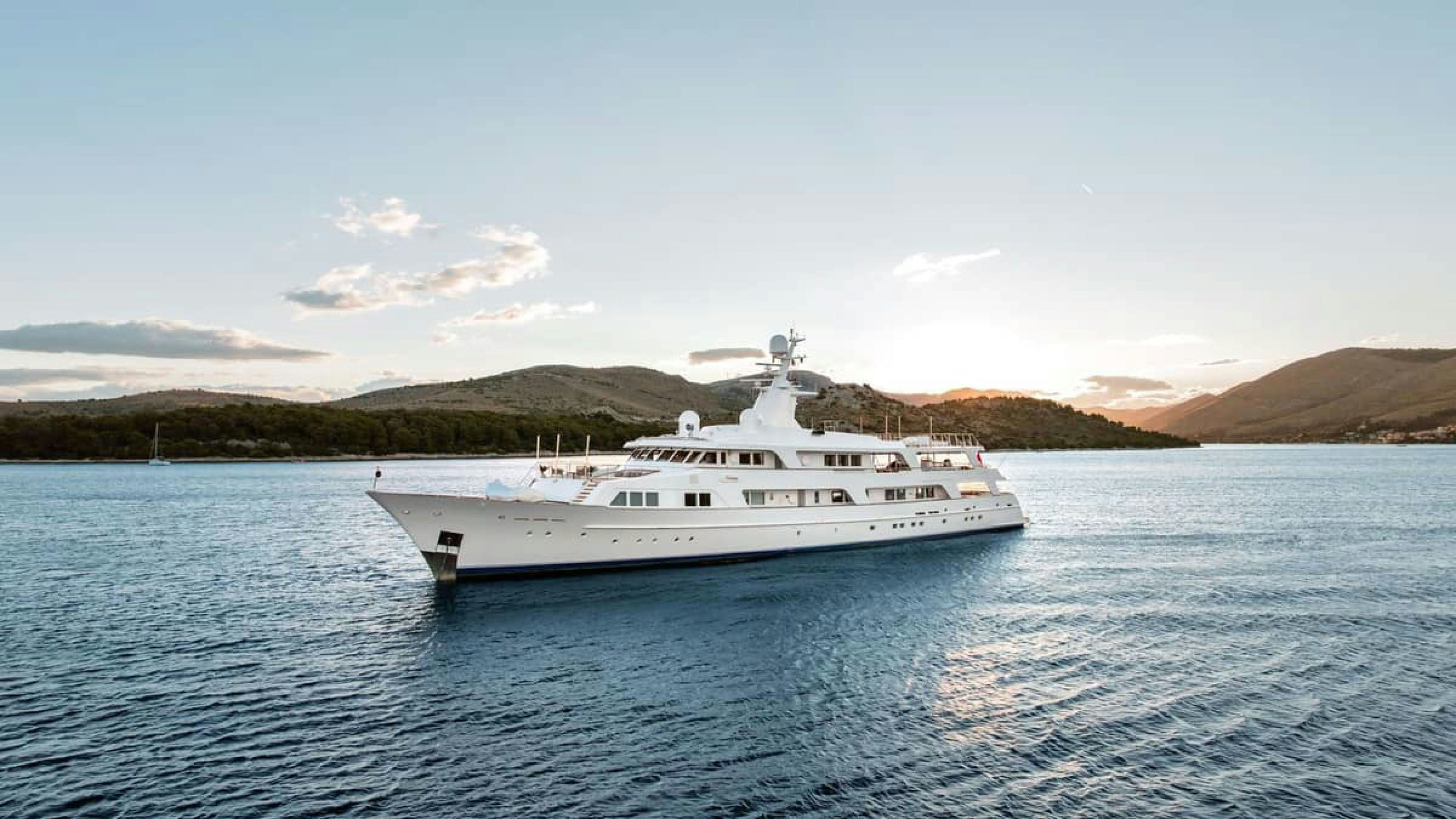 a white boat in the water aboard VICTORY Yacht for Charter