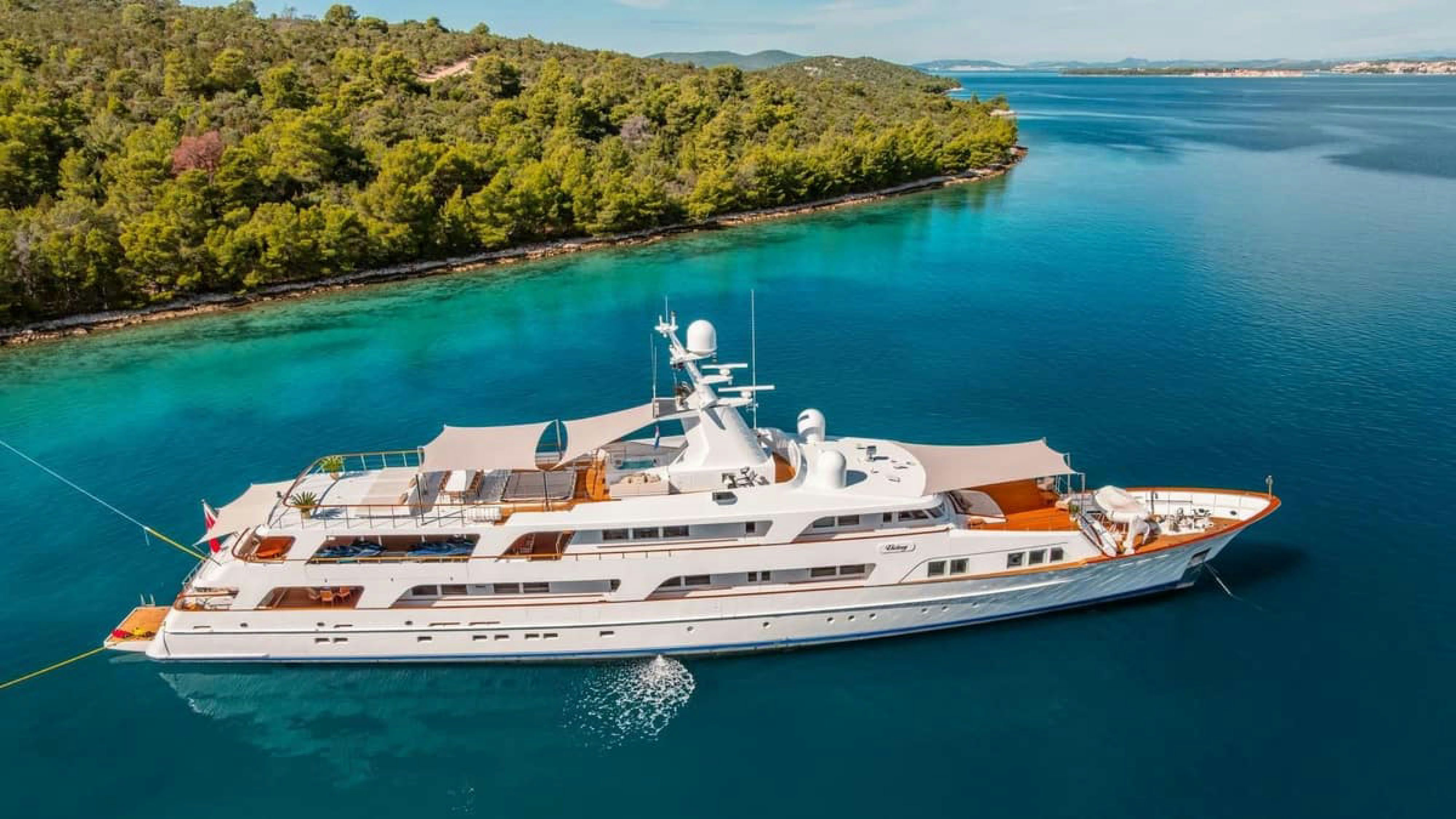 a white boat on the water aboard VICTORY Yacht for Charter