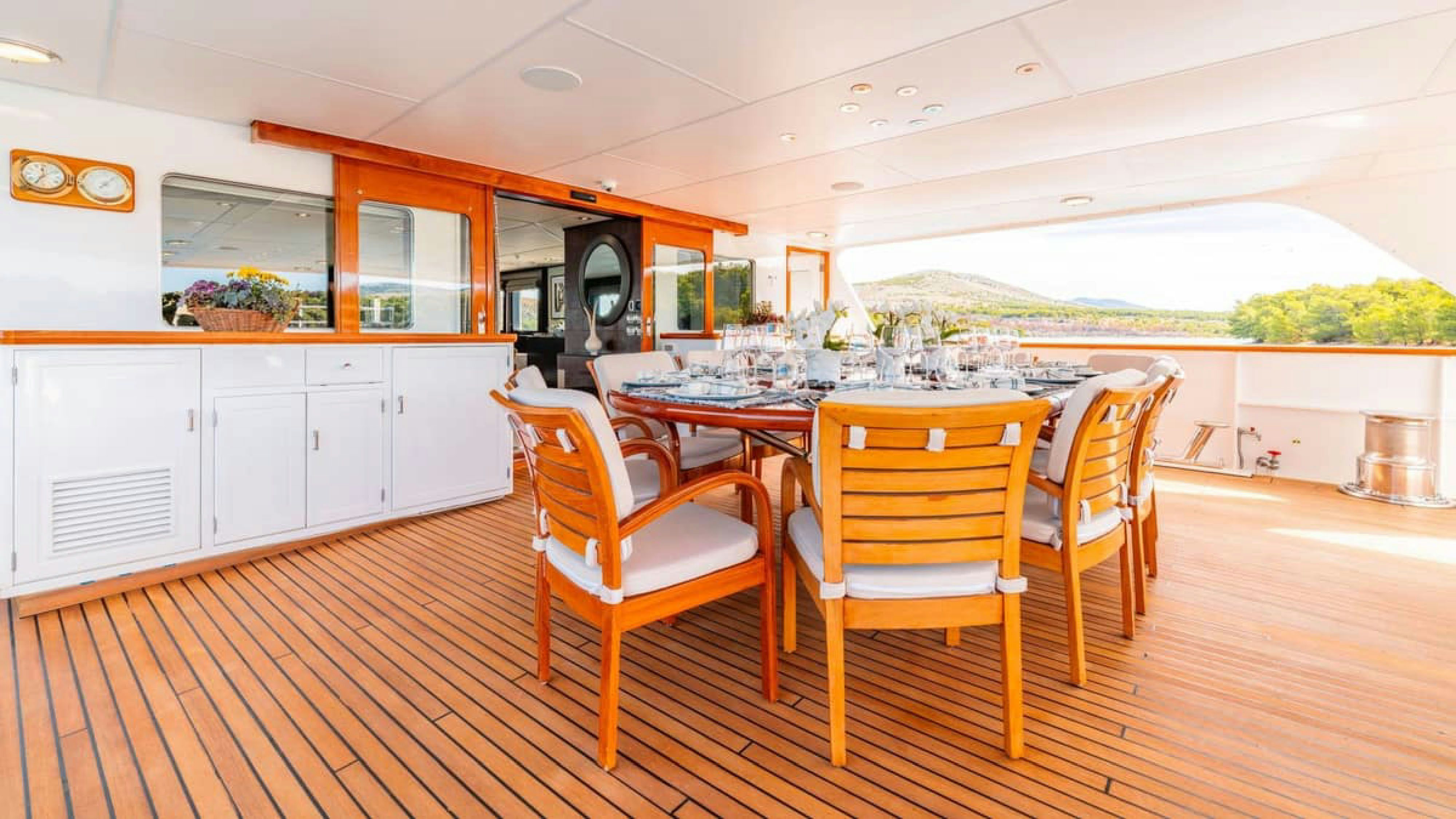 a kitchen with white cabinets aboard VICTORY Yacht for Charter