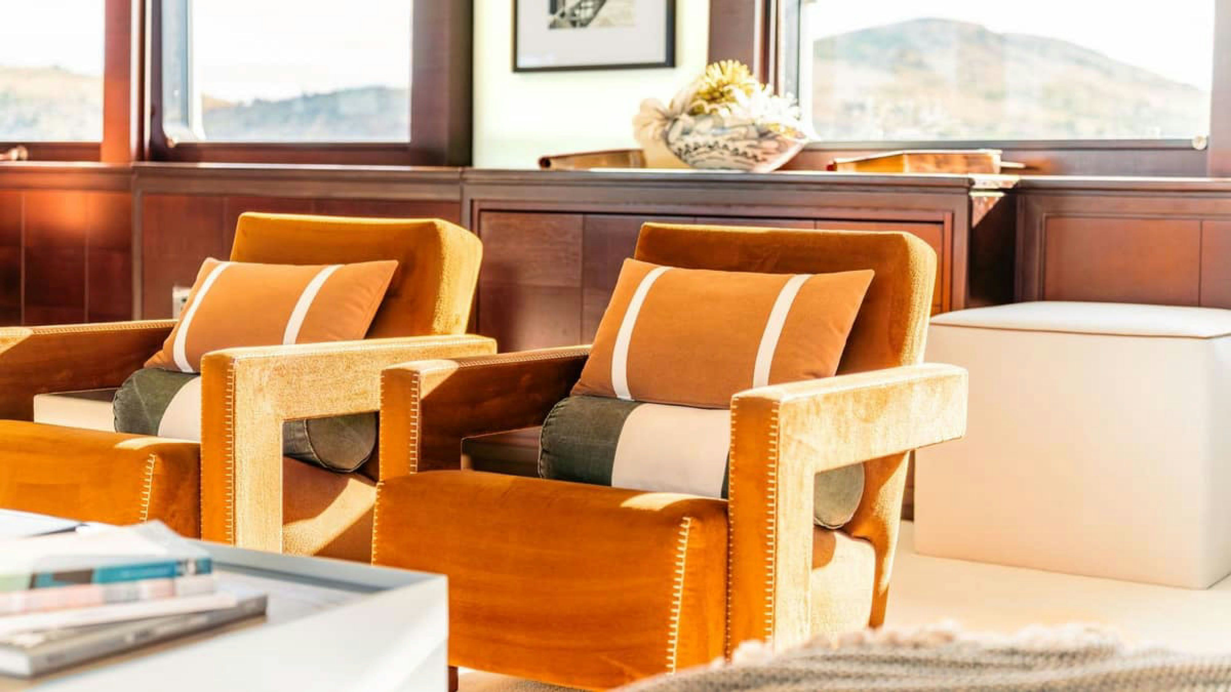 a room with couches and a table aboard VICTORY Yacht for Charter