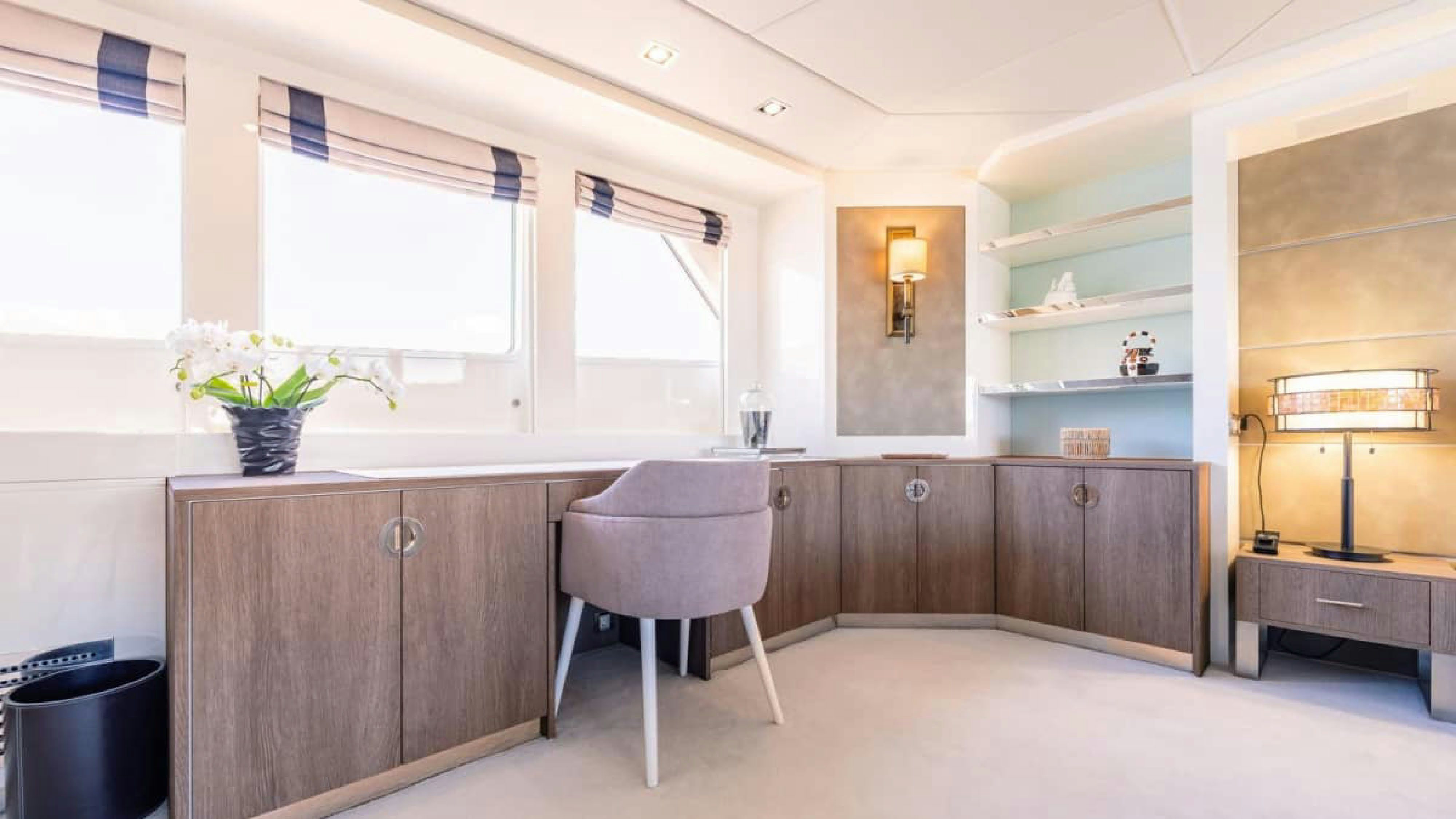 a room with a chair and a desk aboard VICTORY Yacht for Charter