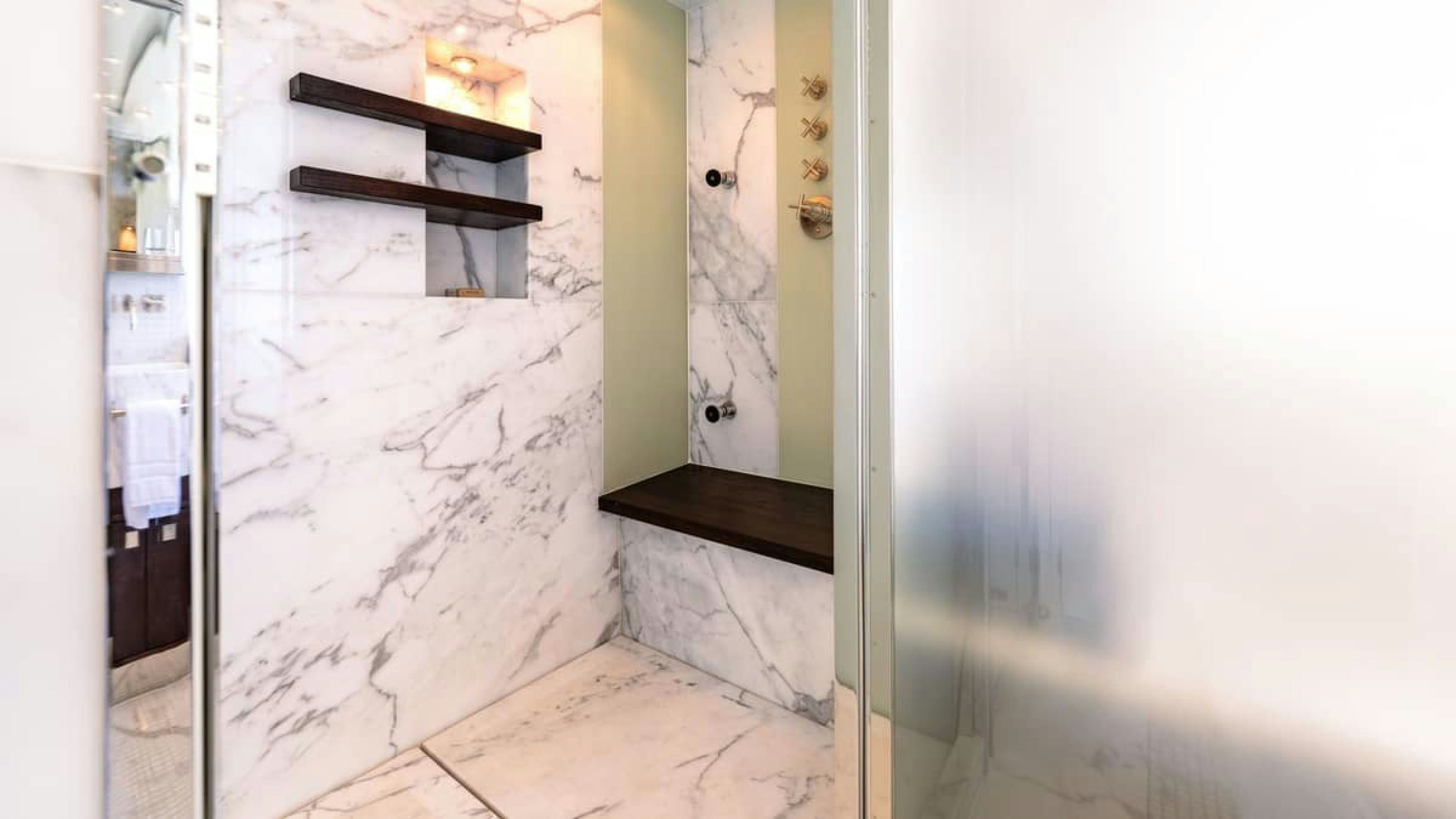 a room with a sink and a shelf aboard VICTORY Yacht for Charter