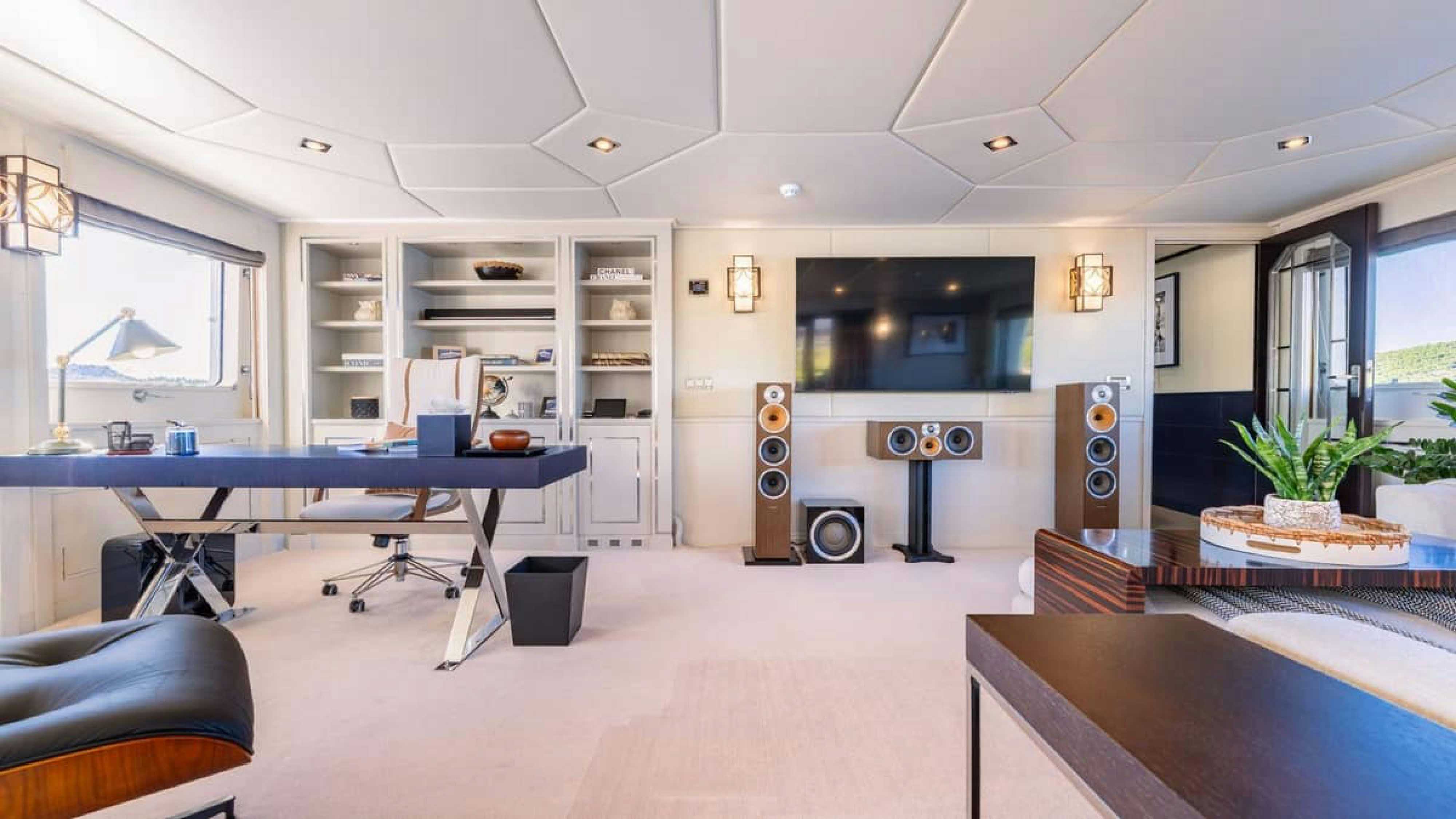 a room with a table and chairs aboard VICTORY Yacht for Charter