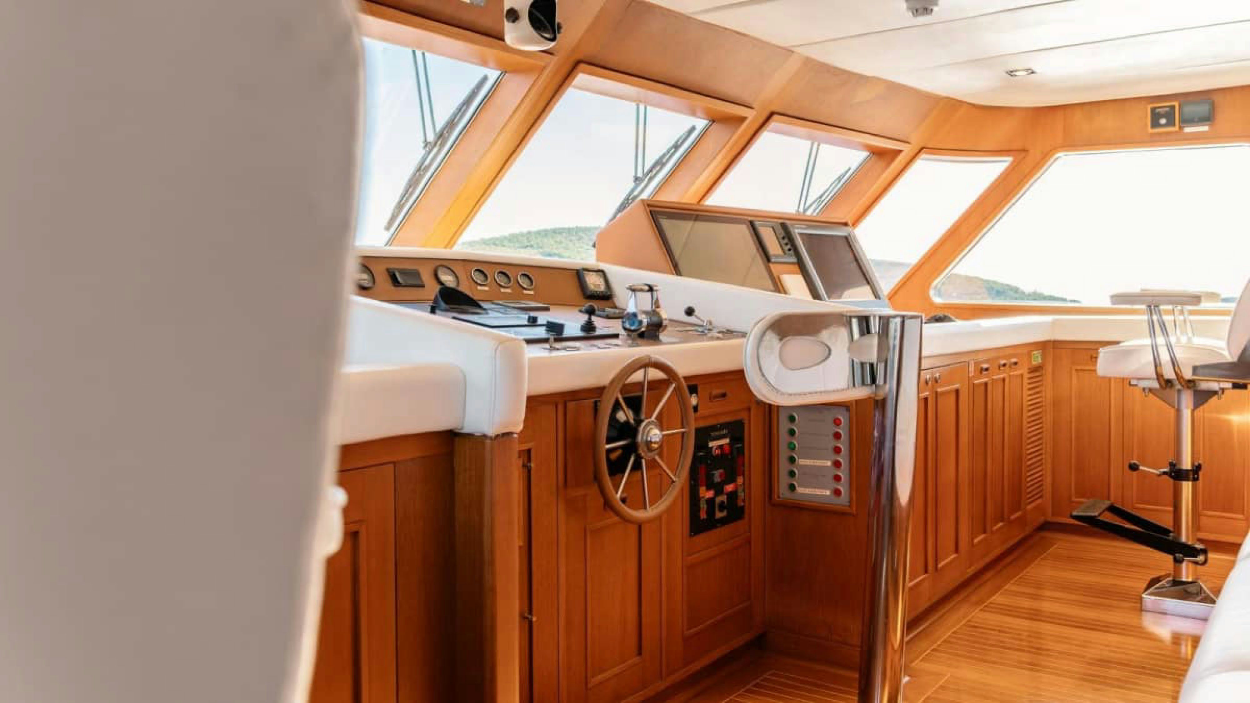 a kitchen with a stove and cabinets aboard VICTORY Yacht for Charter