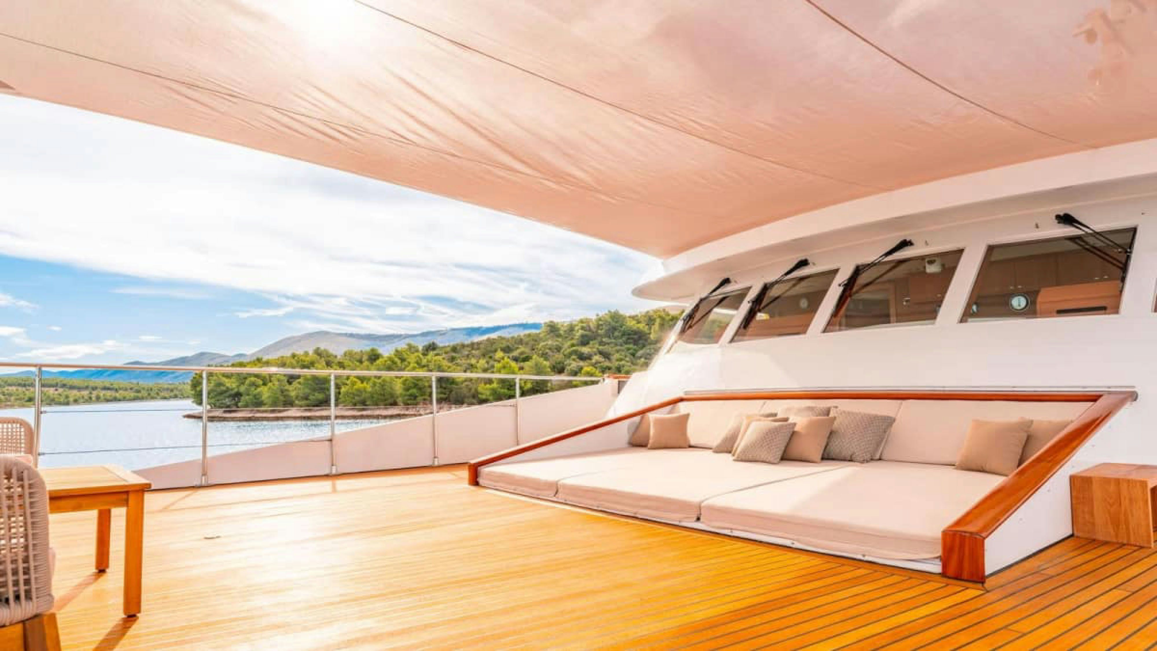 a large bed in a room aboard VICTORY Yacht for Charter