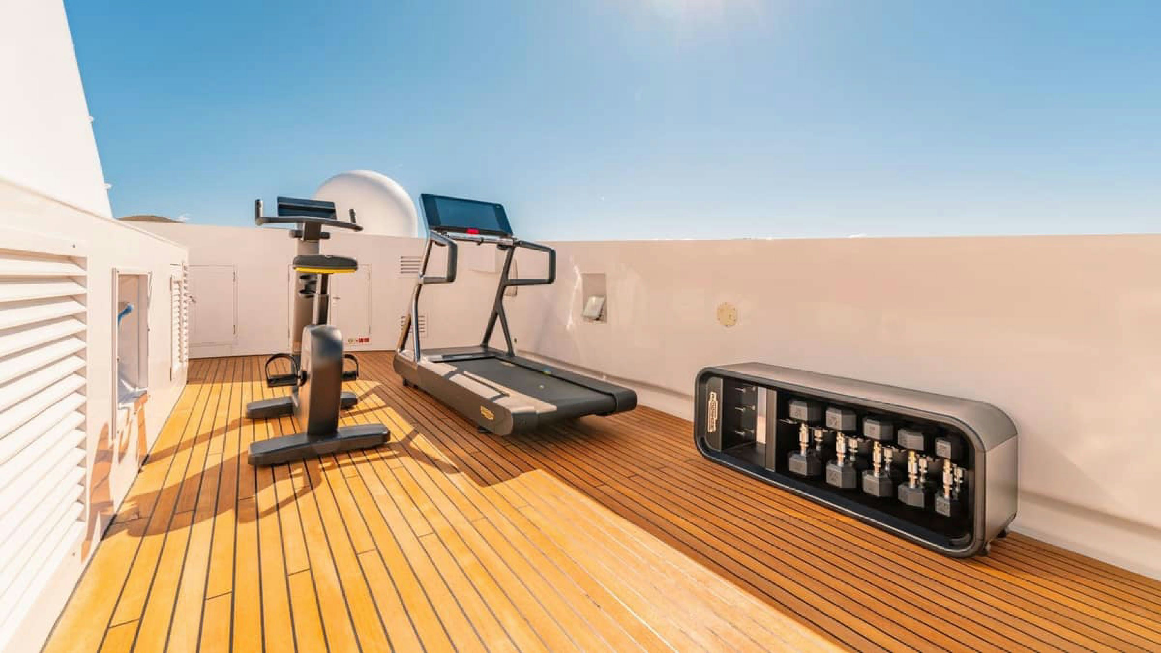 a machine on the floor aboard VICTORY Yacht for Charter