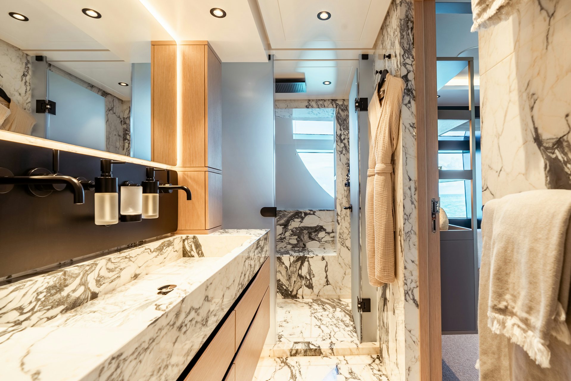 a bathroom with a marble countertop aboard VIVACE Yacht for Charter