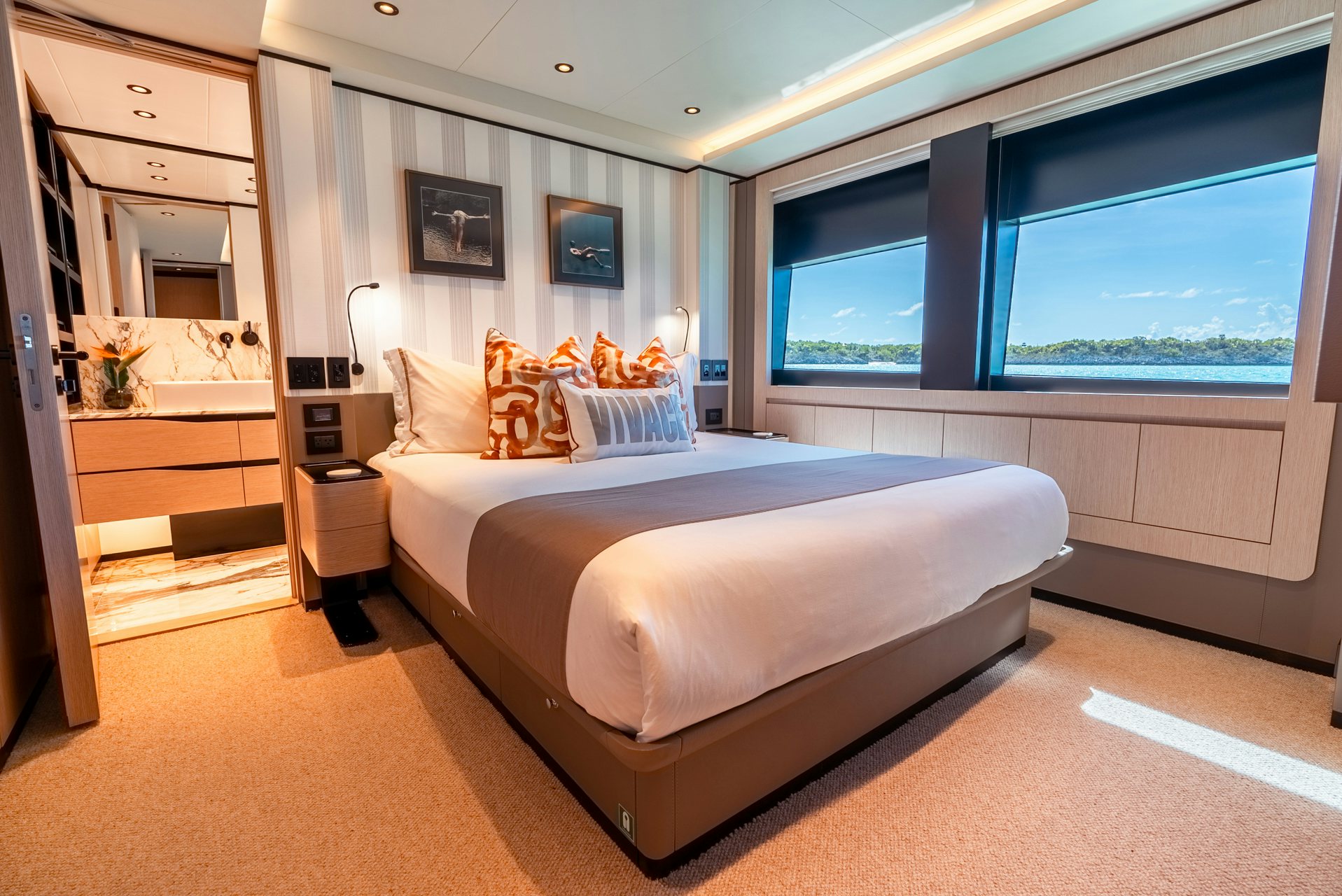 a bedroom with a large bed aboard VIVACE Yacht for Charter