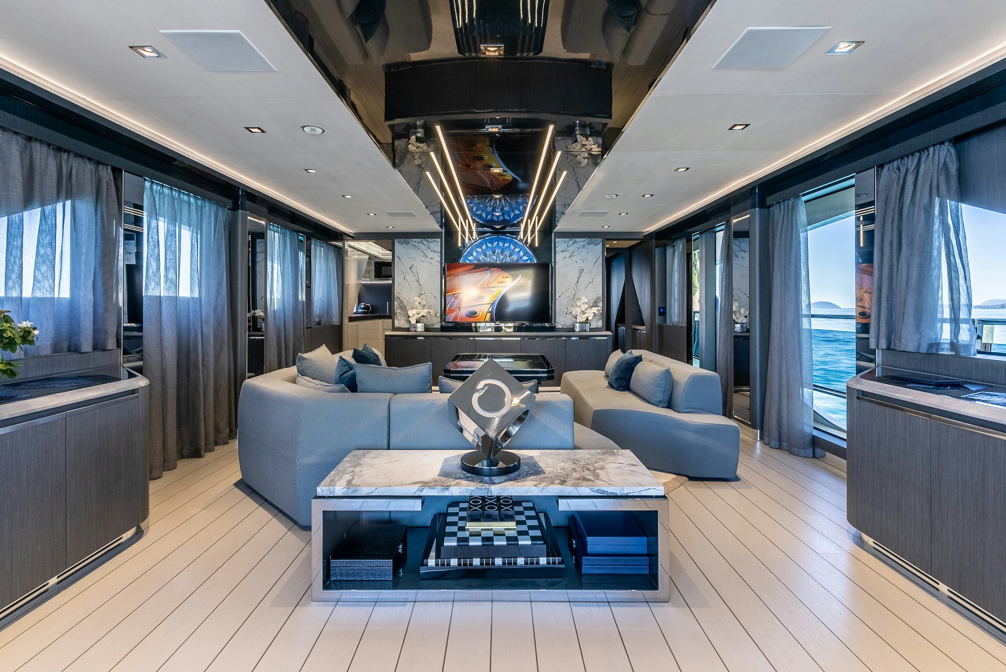 a living room with a large open floor plan aboard CADET V Yacht for Sale