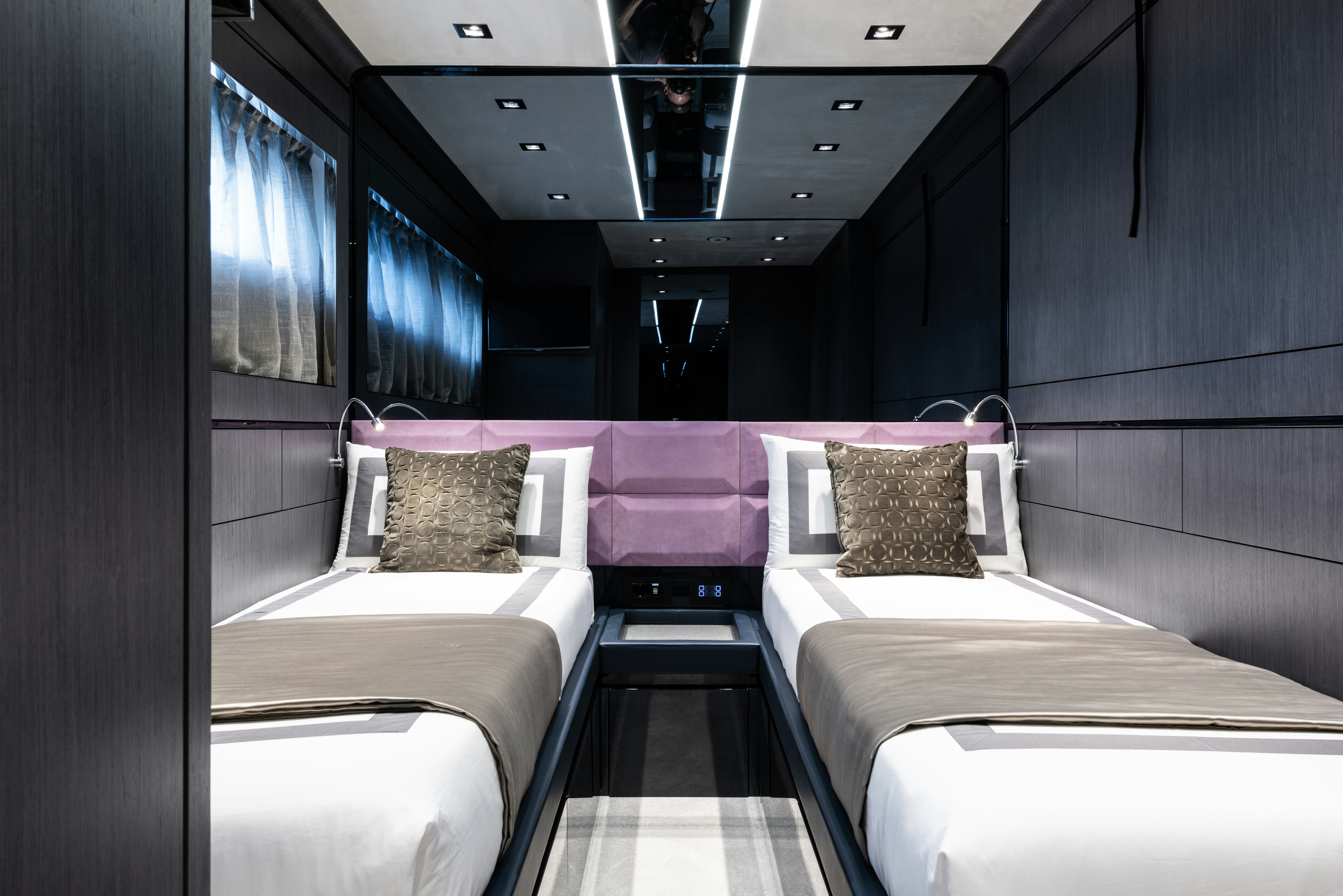 a room with two beds aboard CADET V Yacht for Sale