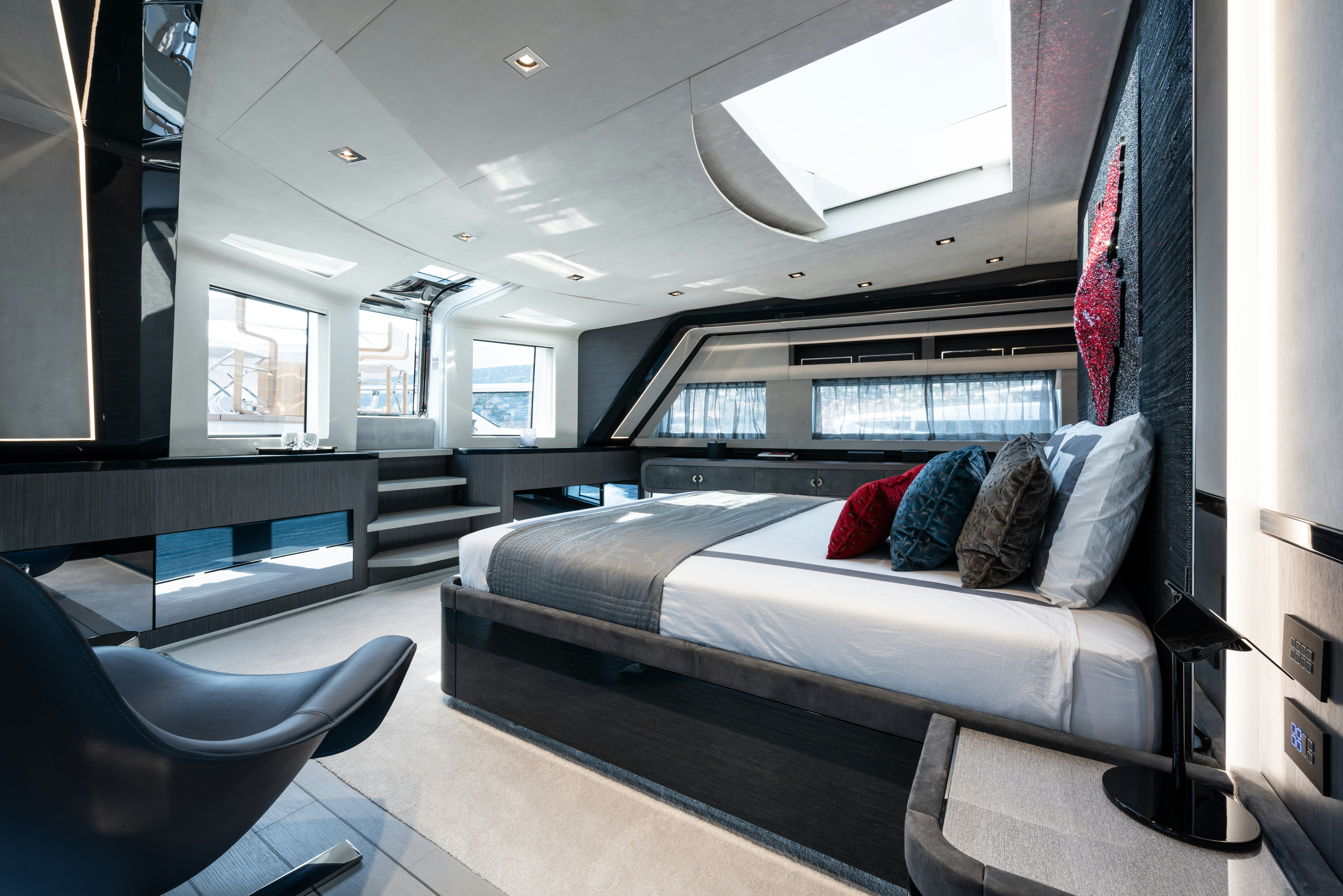 a room with a couch and a window aboard CADET V Yacht for Sale