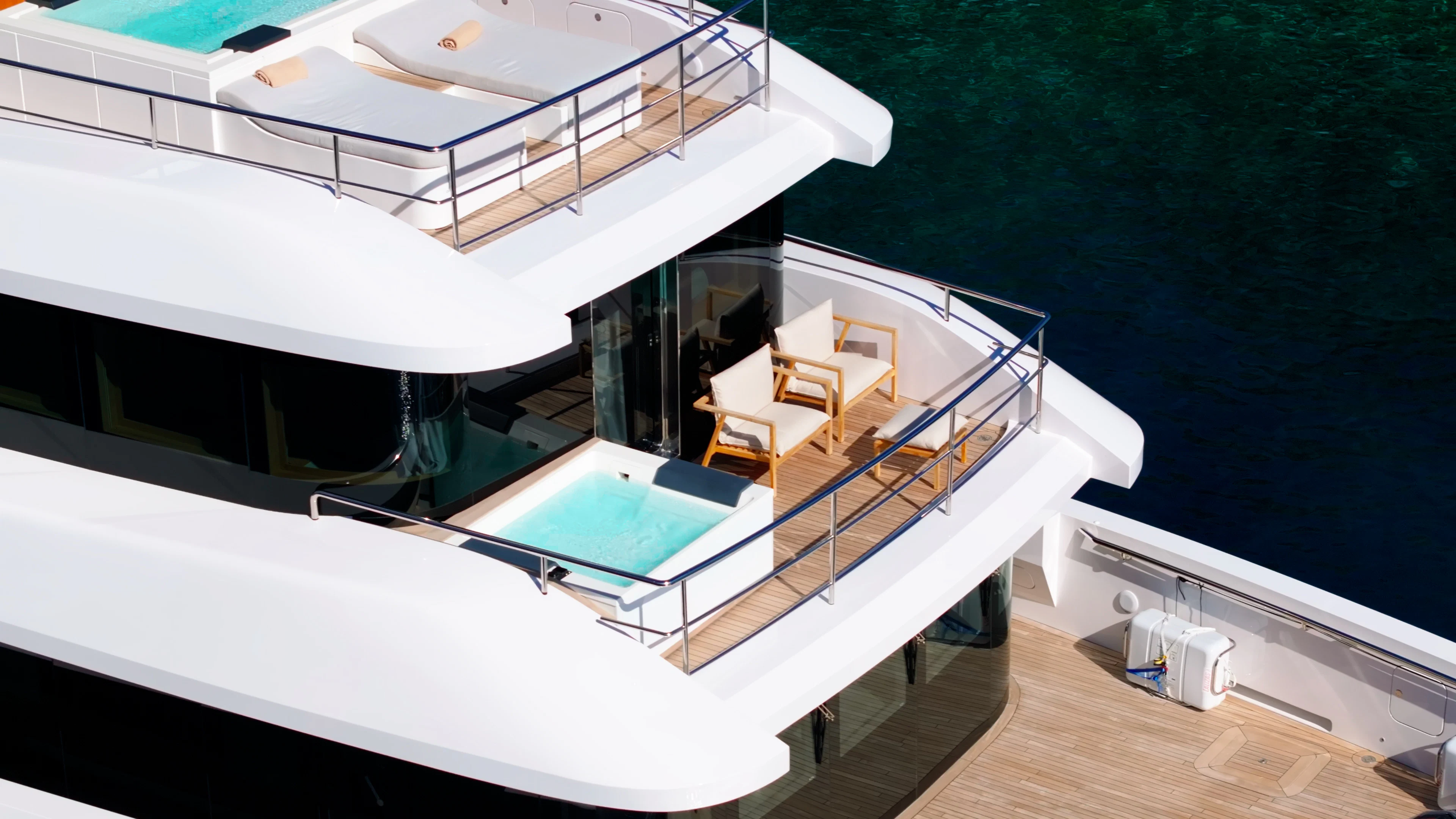 a large white boat on a wooden deck aboard RENATA Yacht for Charter