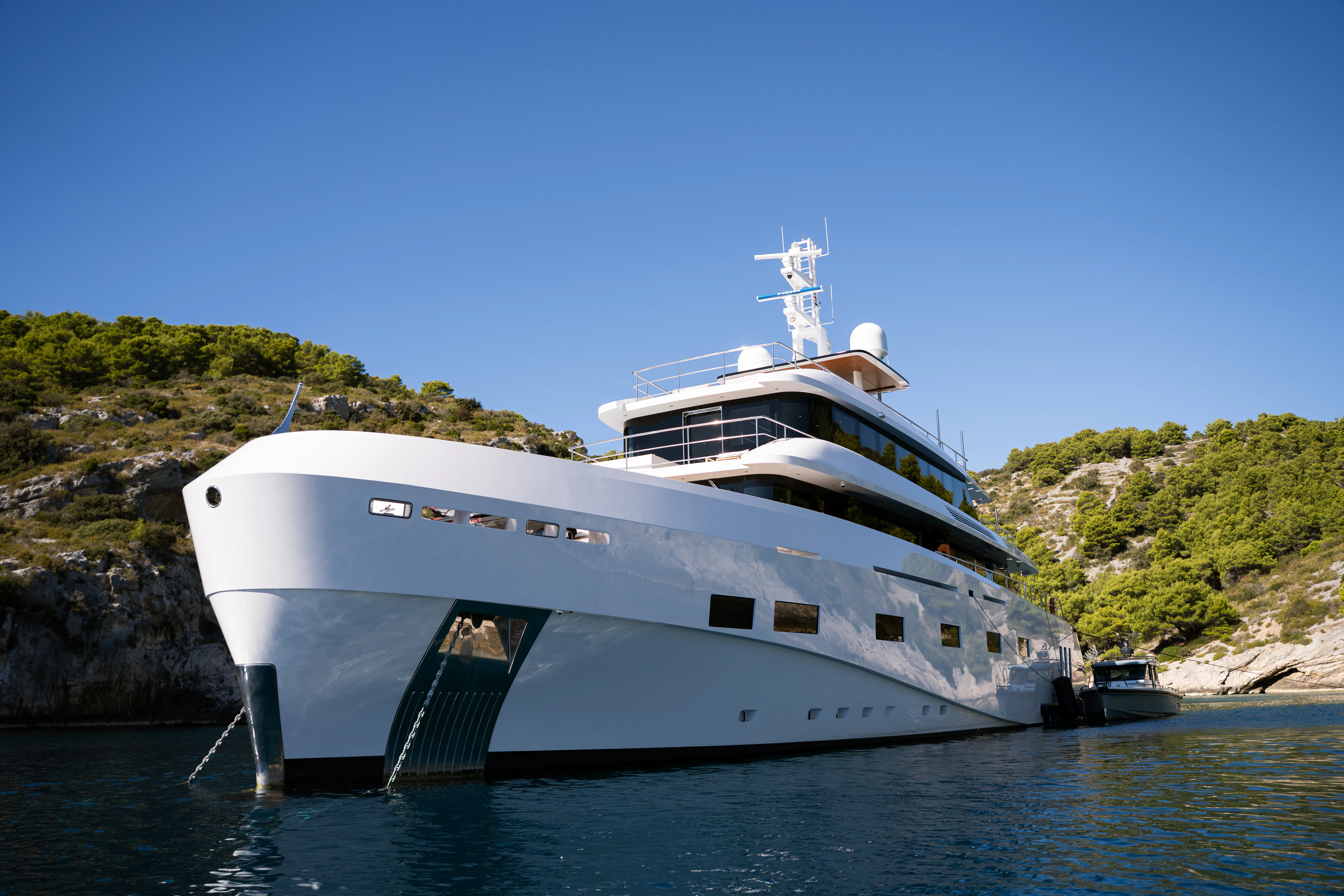 a large white boat in the water aboard RENATA Yacht for Charter