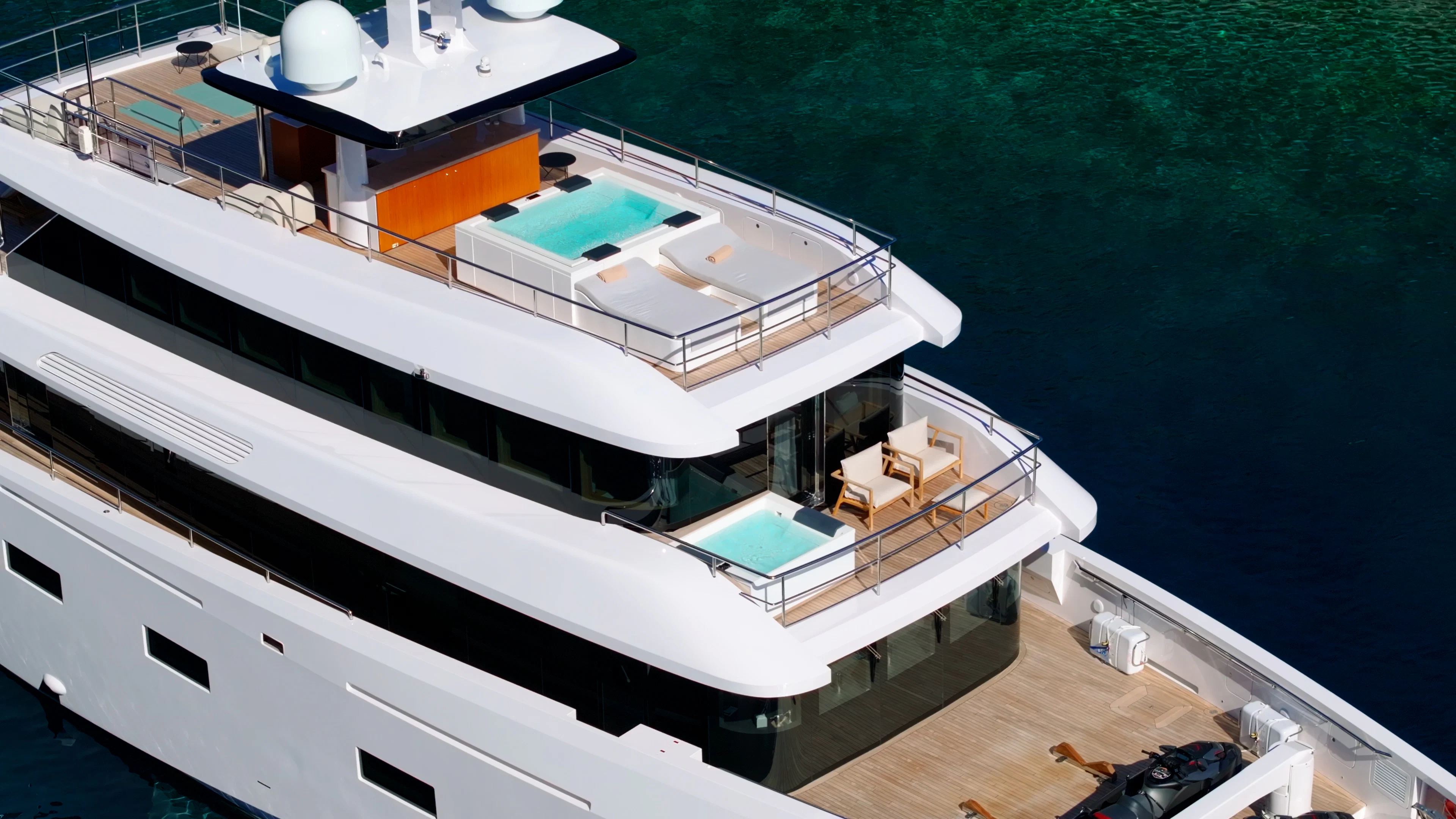 a large white boat on a body of water aboard RENATA Yacht for Charter