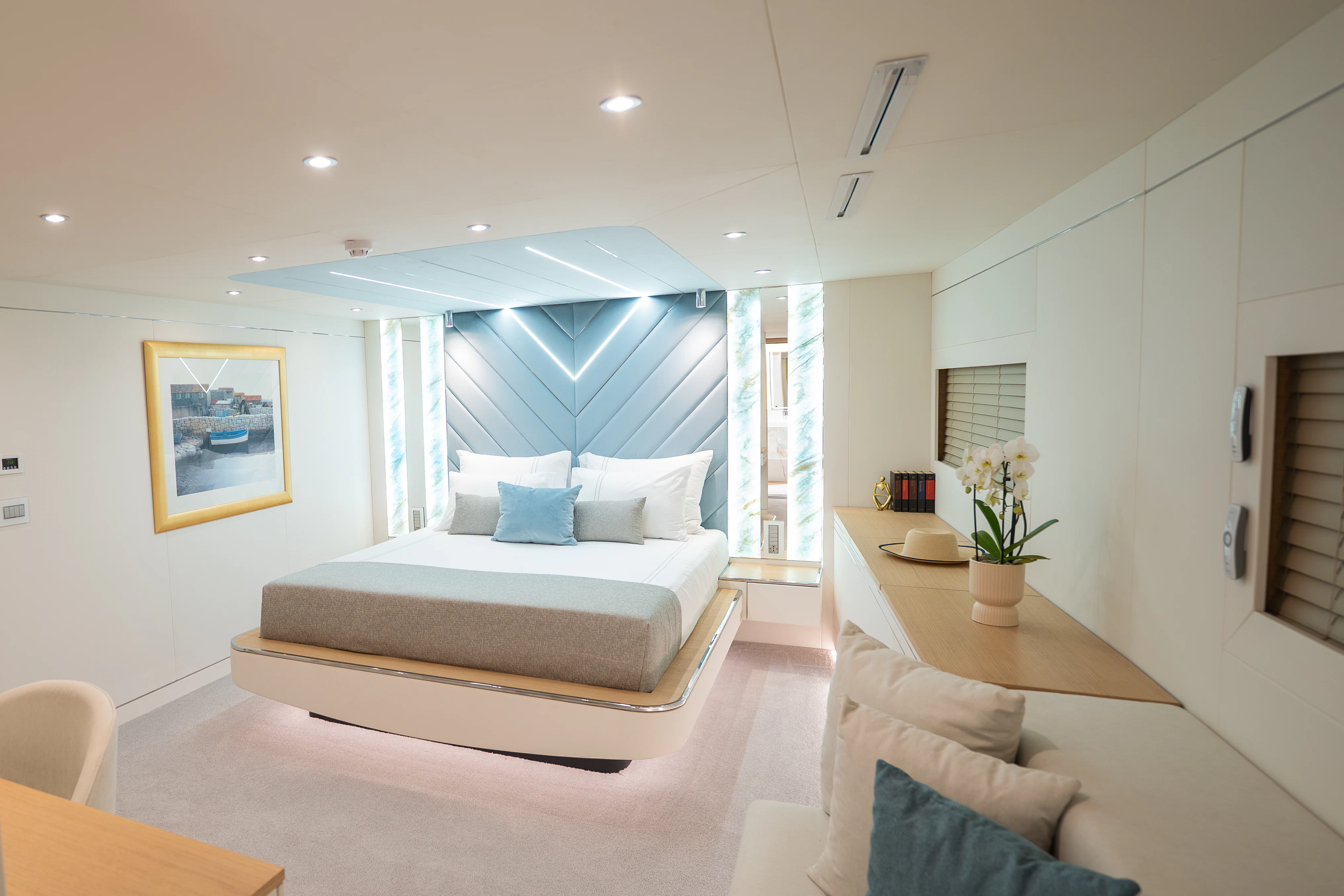 a living room with a large window aboard RENATA Yacht for Charter
