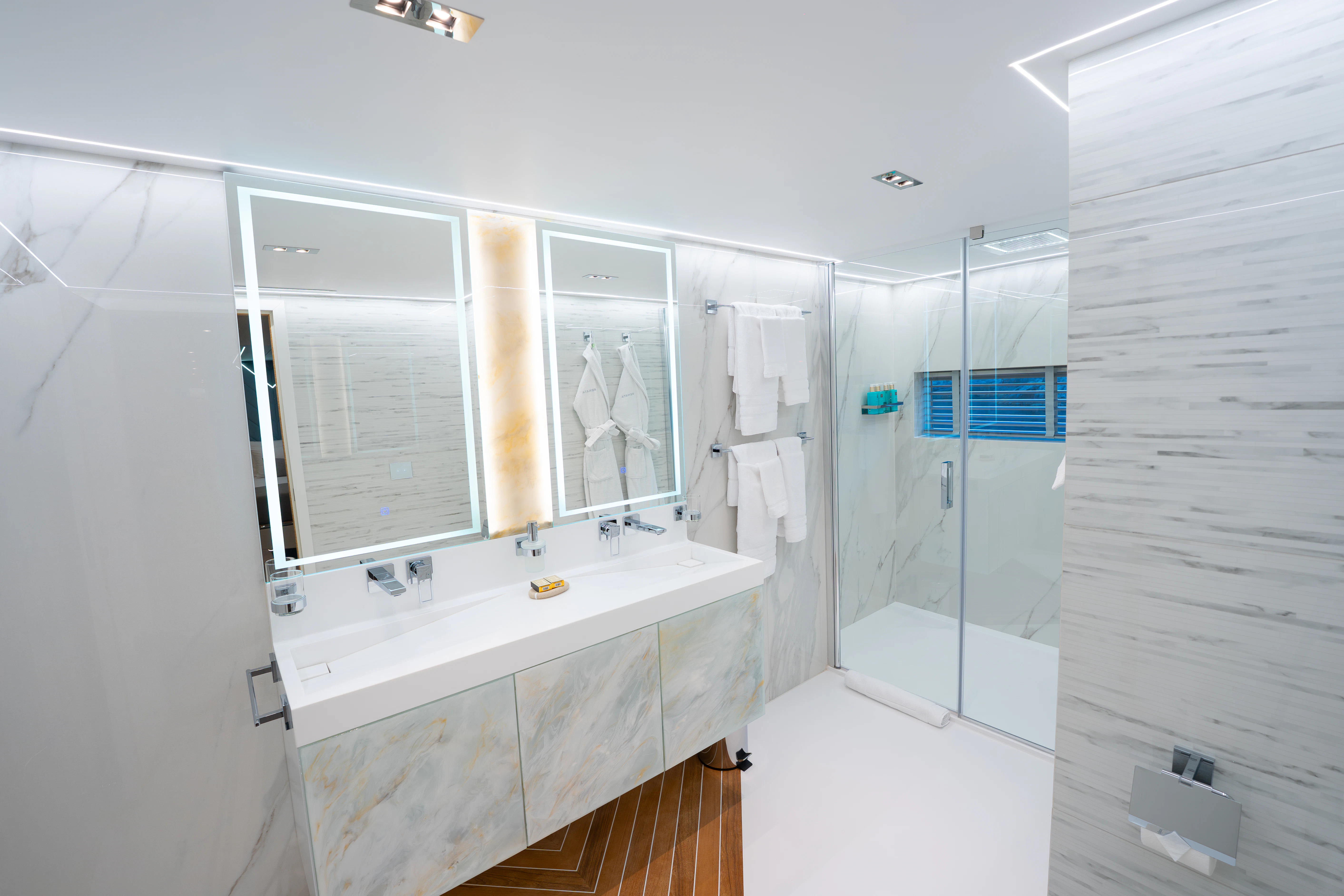 a bathroom with a sink and a shower aboard RENATA Yacht for Charter