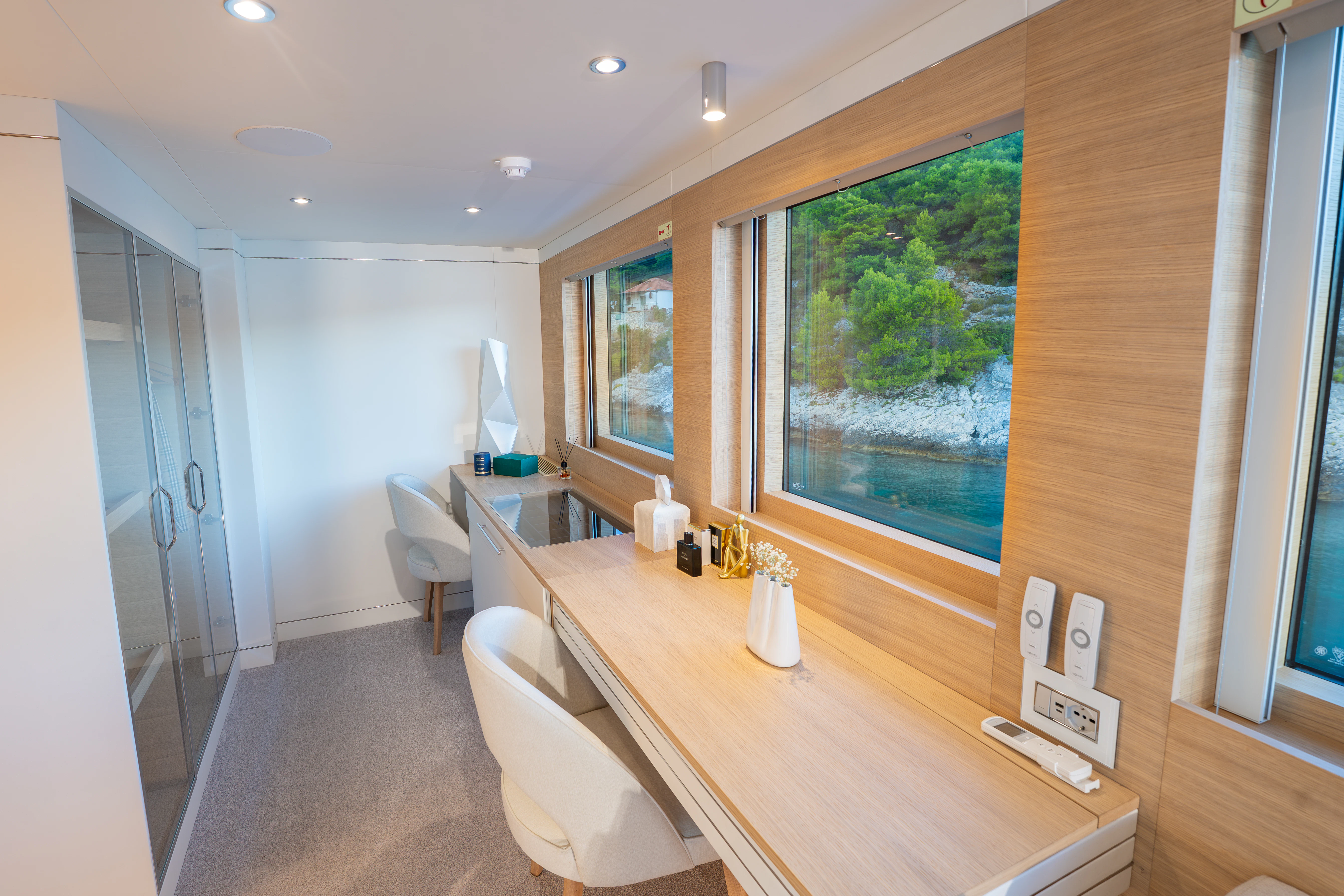 a room with a table and chairs aboard RENATA Yacht for Charter