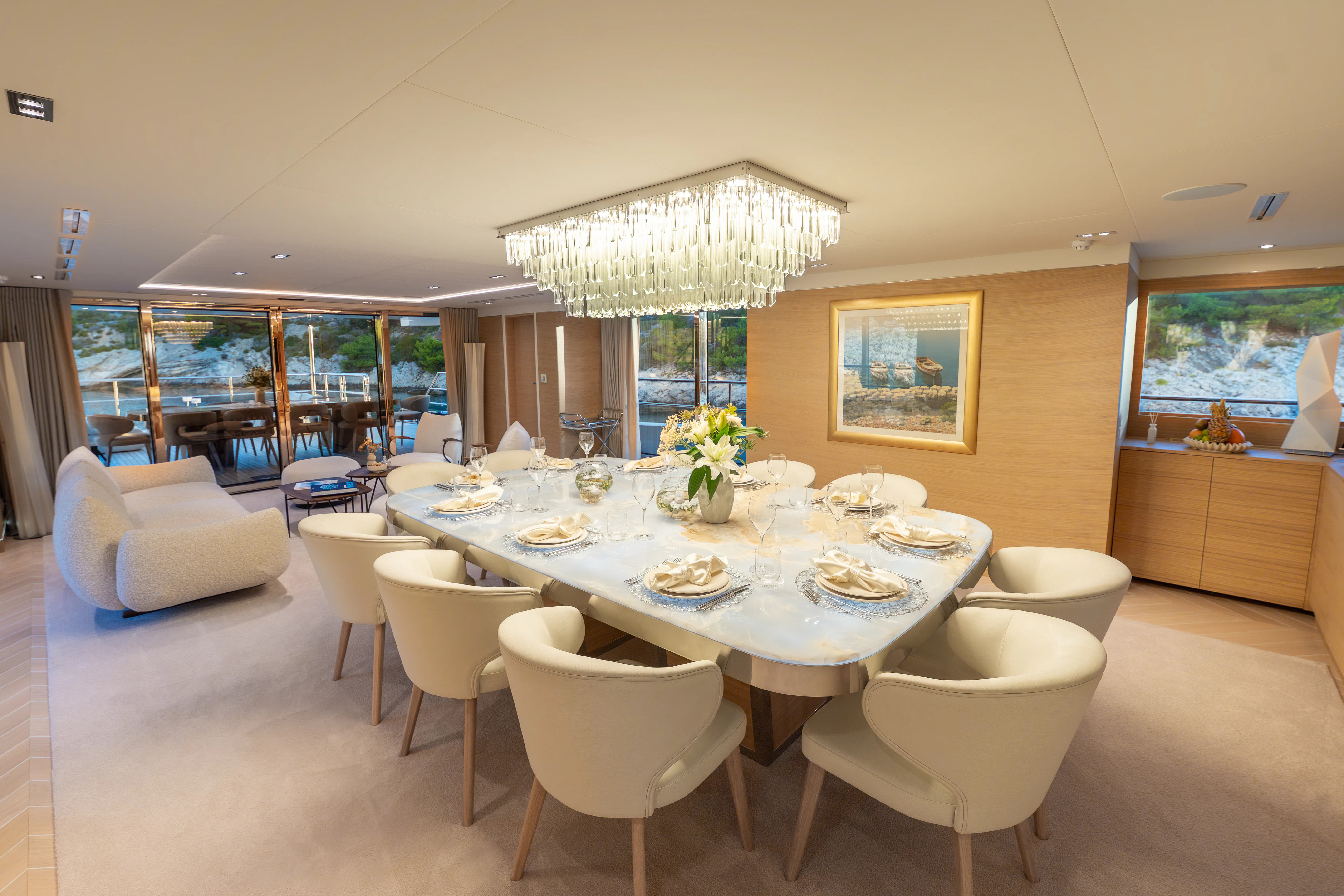a dining room with a large table aboard RENATA Yacht for Charter