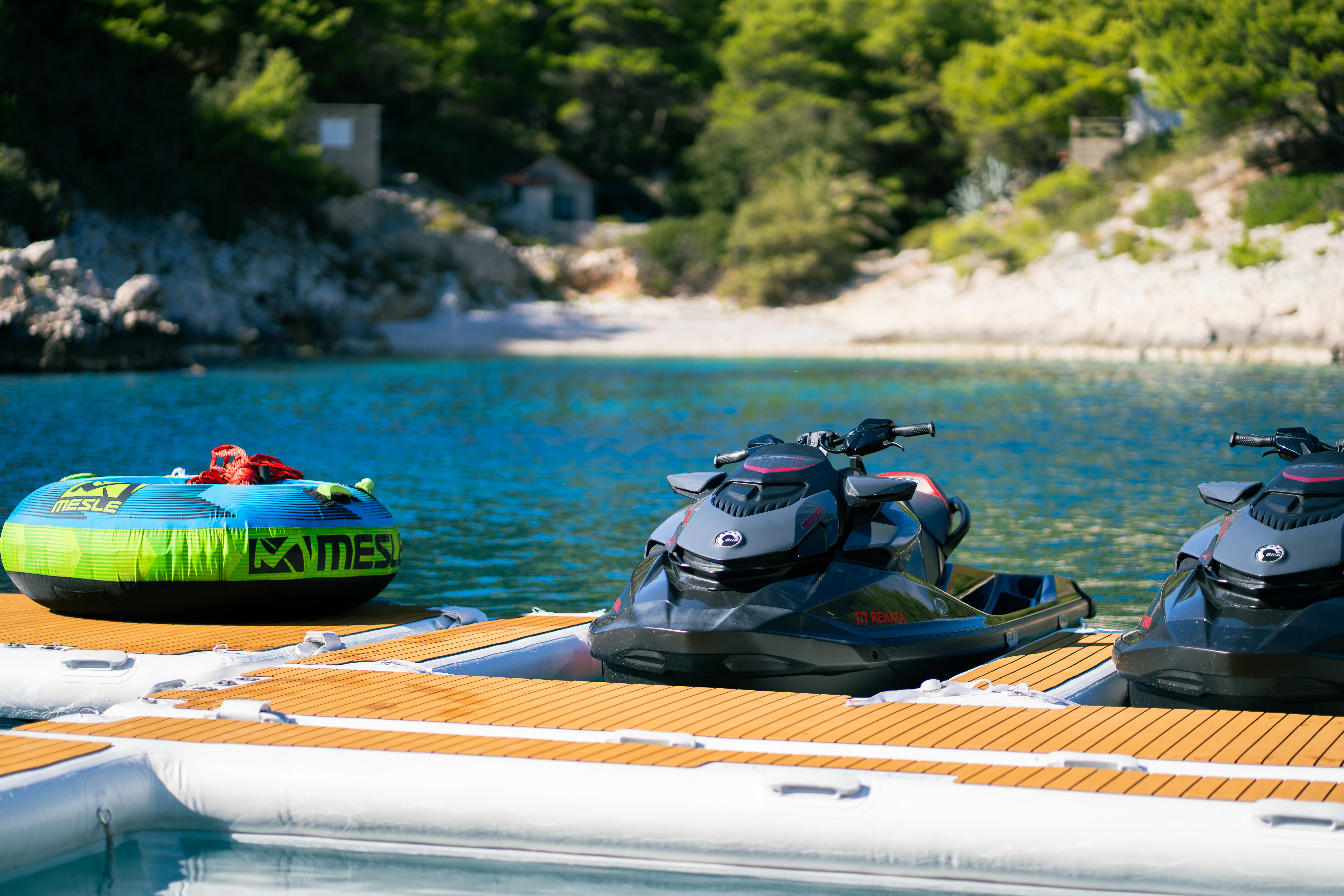a group of boats on a body of water aboard RENATA Yacht for Charter