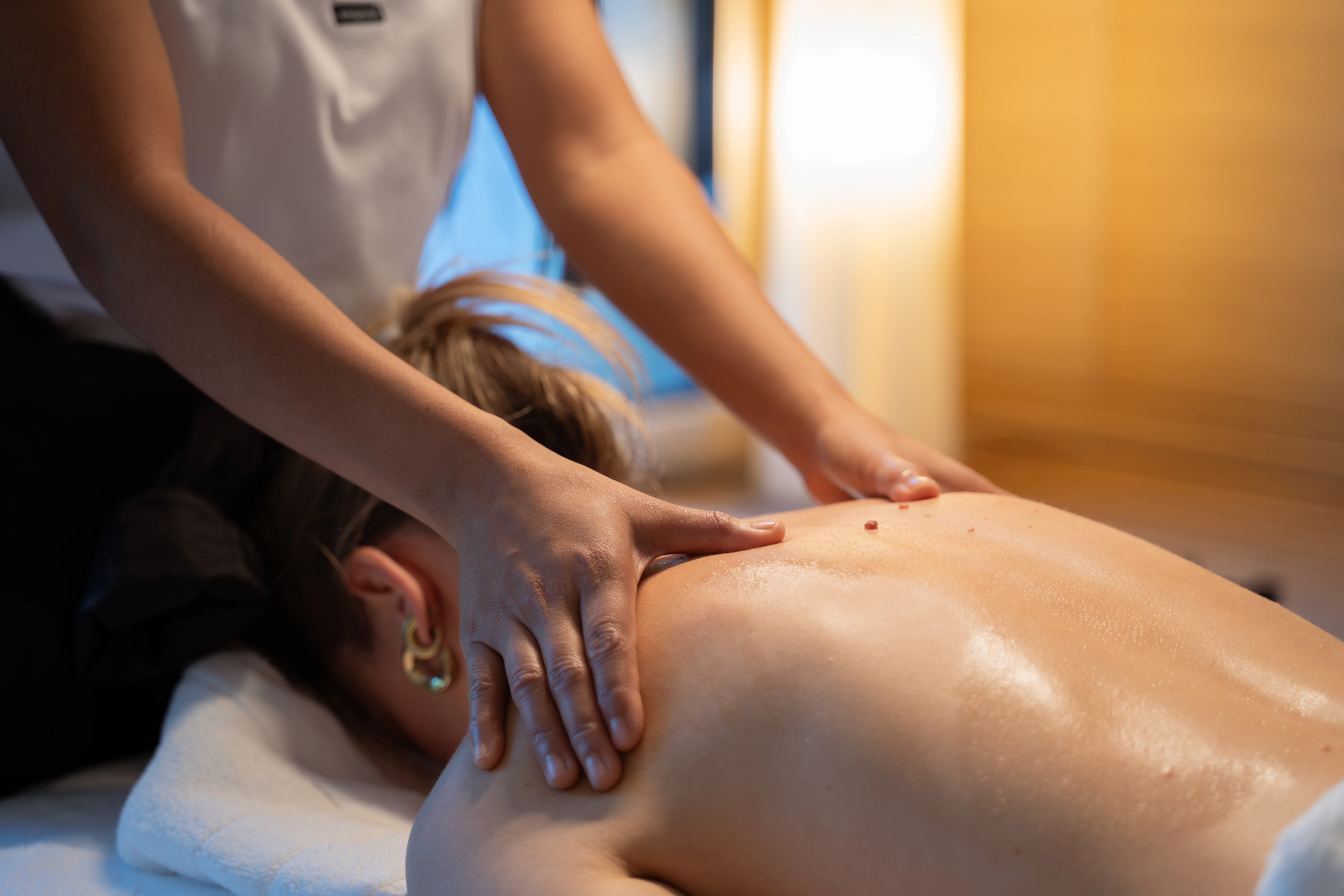 a woman holding a baby aboard RENATA Yacht for Charter