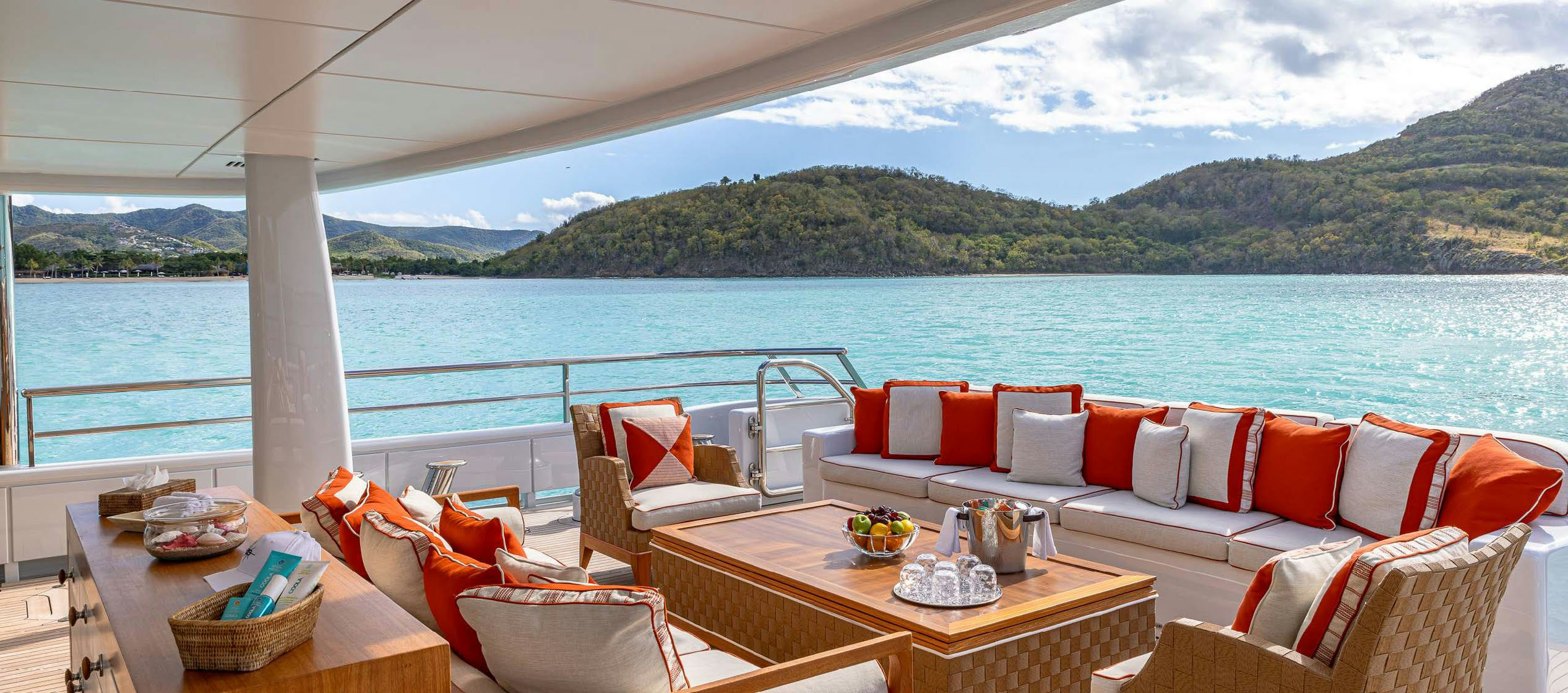 a large patio with a table and chairs on it aboard DEEP BLUE Yacht for Charter