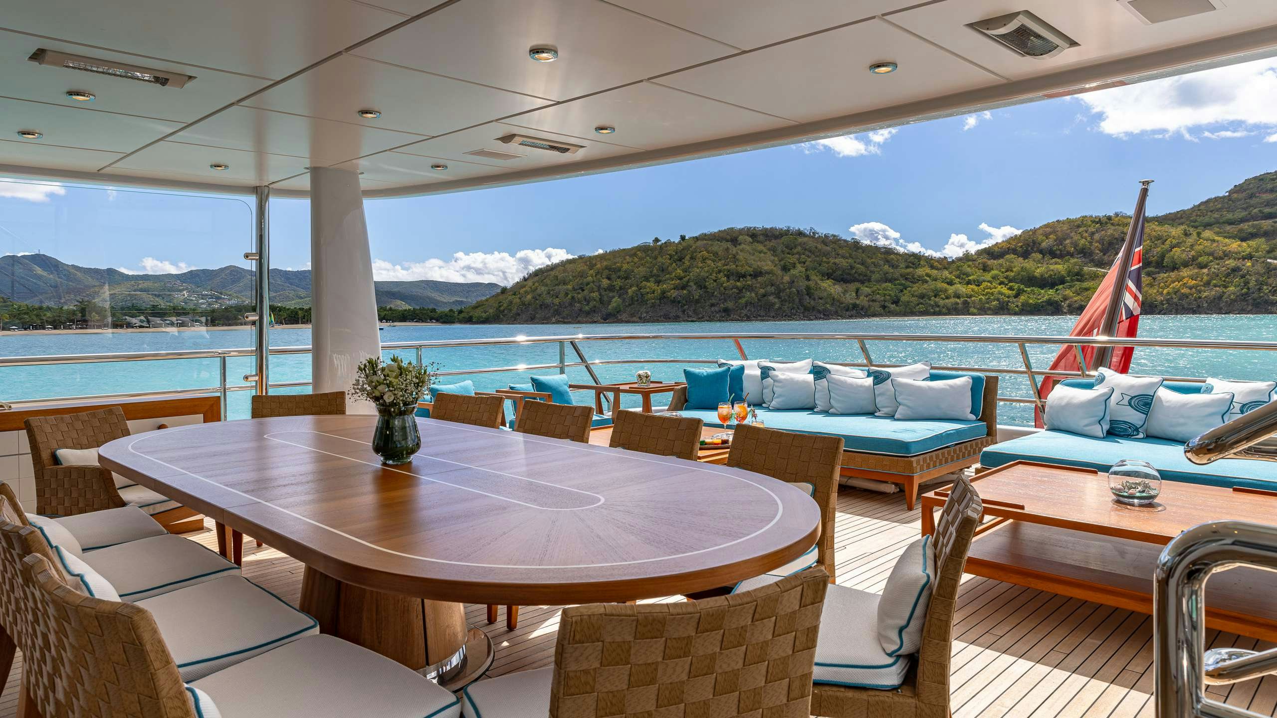 a large boat on a body of water aboard DEEP BLUE Yacht for Charter