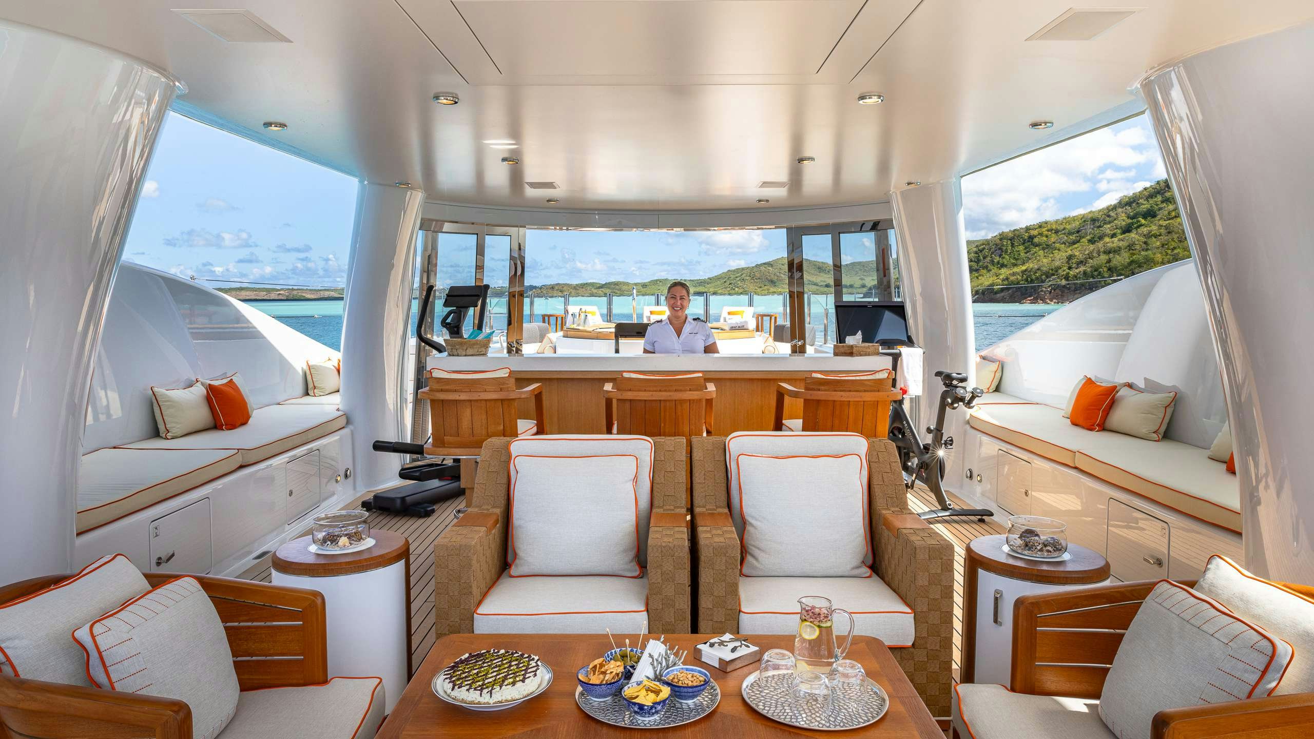 a person sitting in a room aboard DEEP BLUE Yacht for Charter