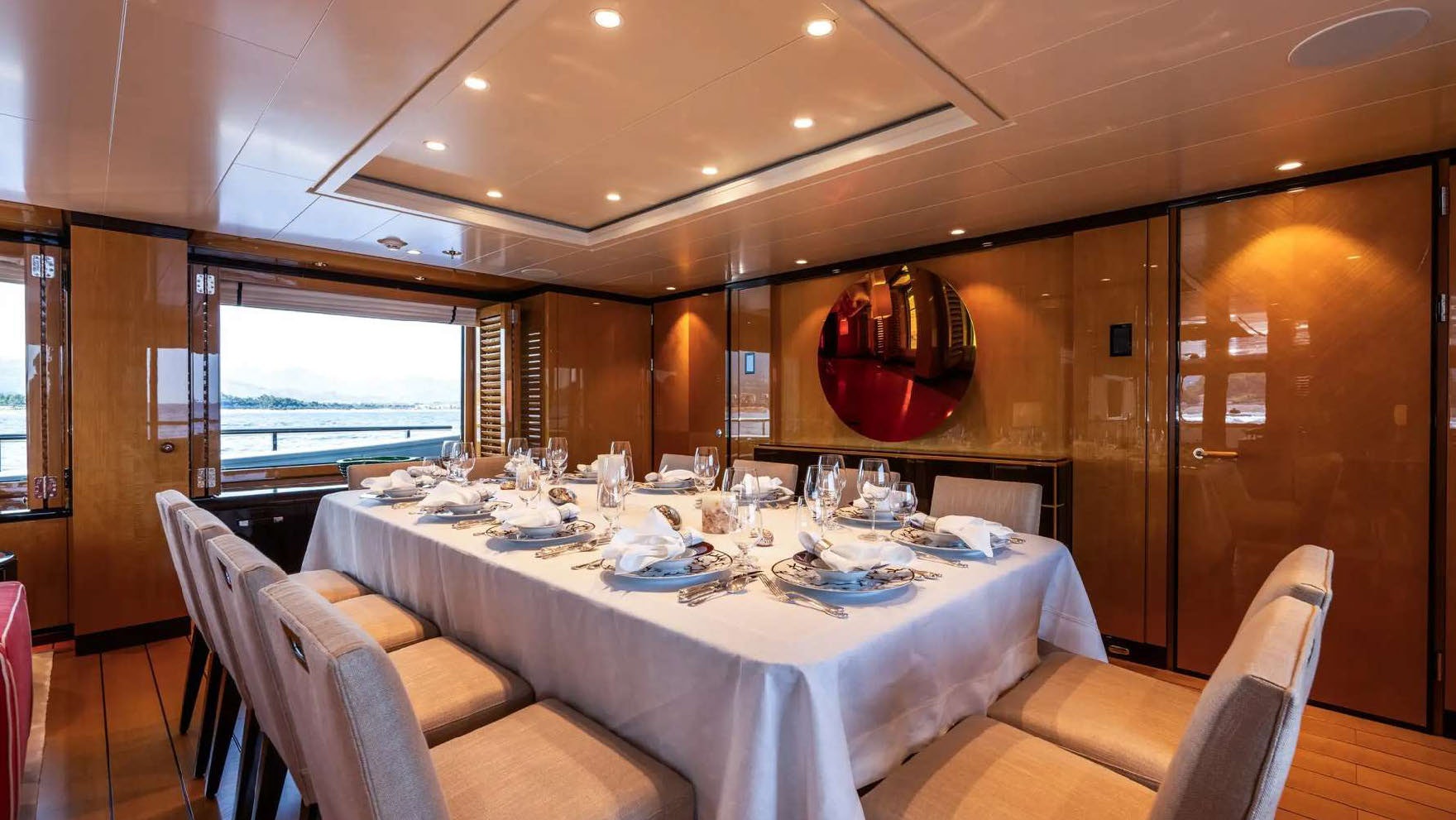 a dining room with a table aboard DEEP BLUE Yacht for Charter