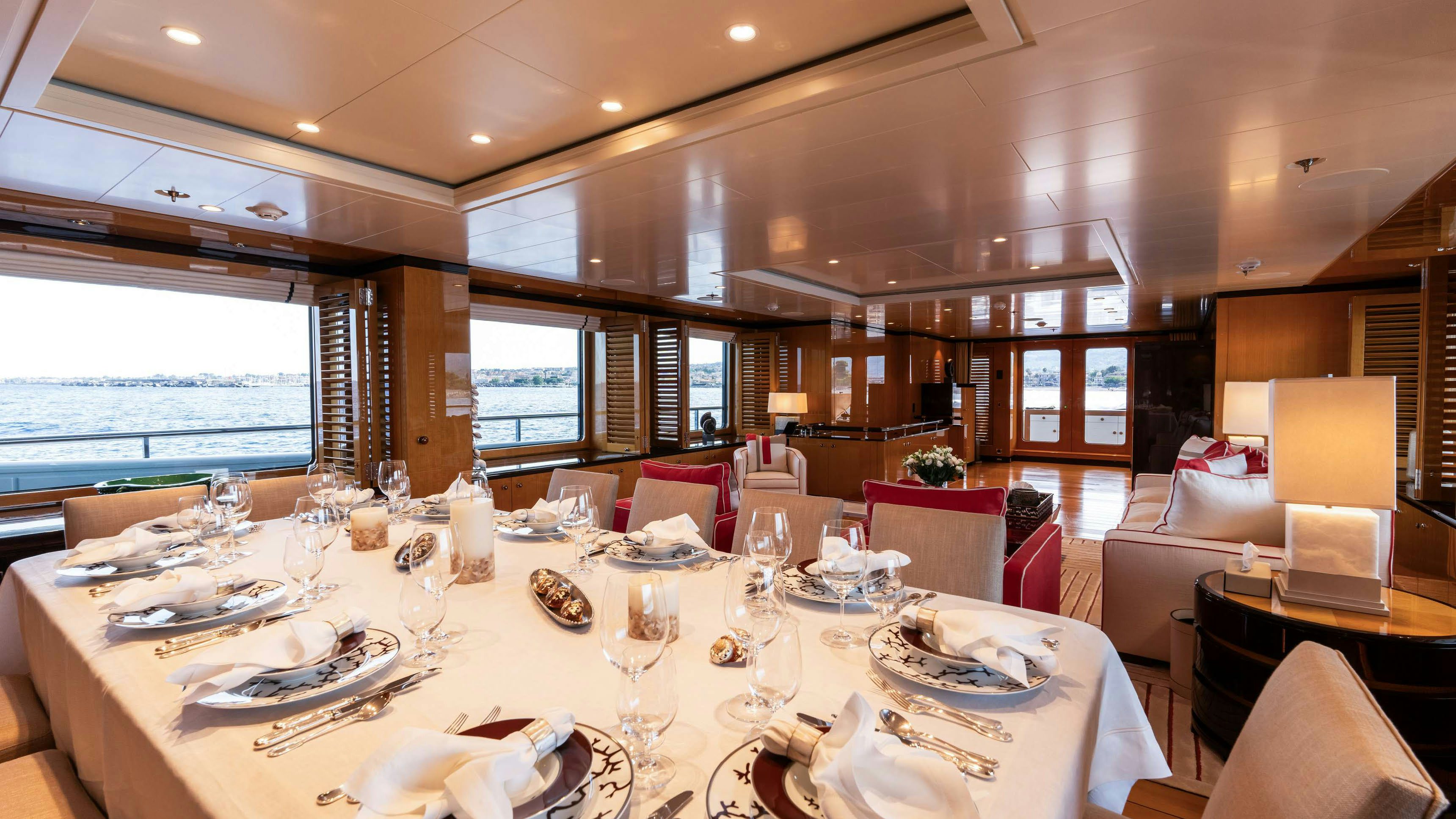 a table set for a dinner aboard DEEP BLUE Yacht for Charter
