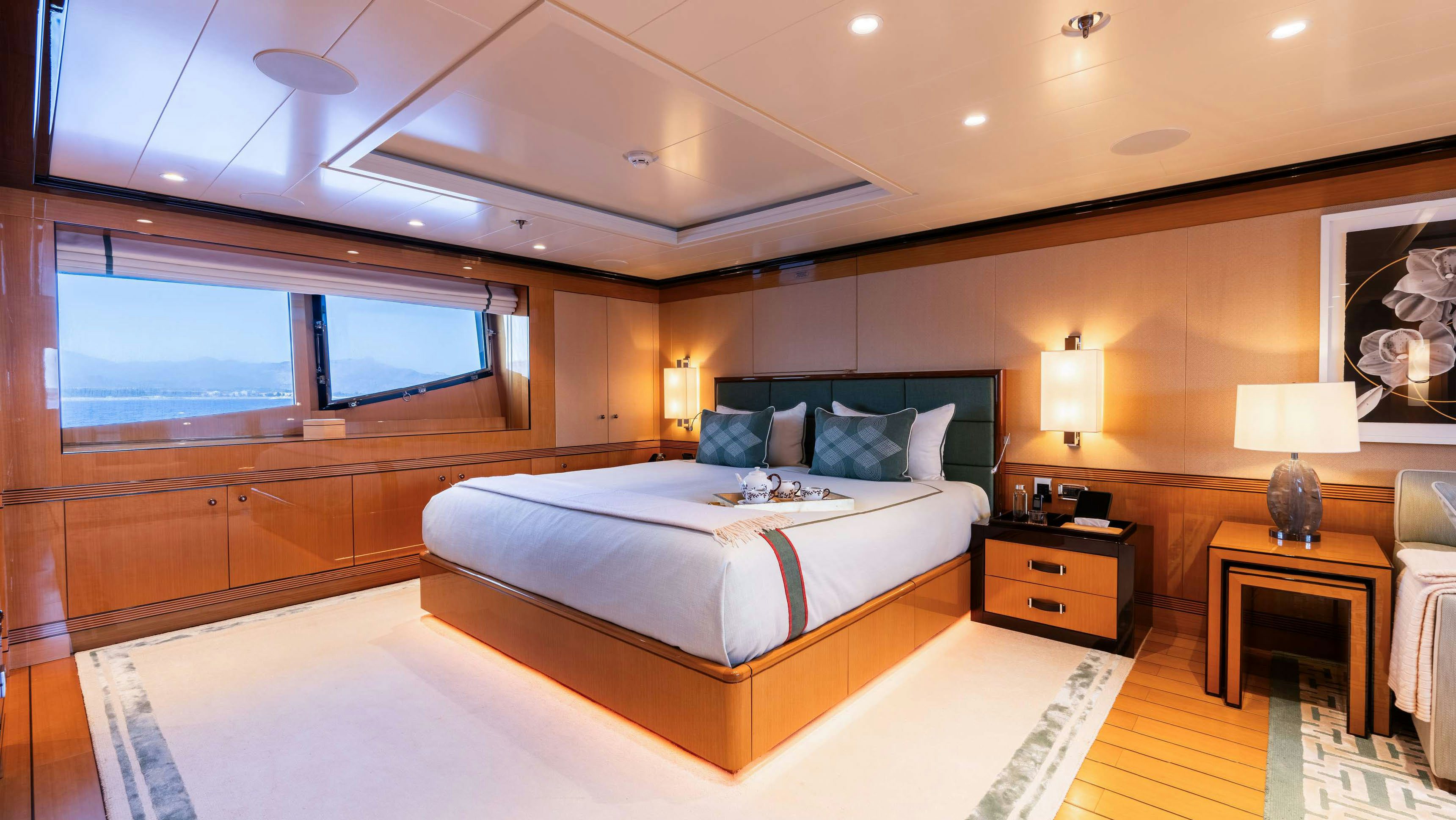 a large bedroom with a large bed aboard DEEP BLUE Yacht for Charter