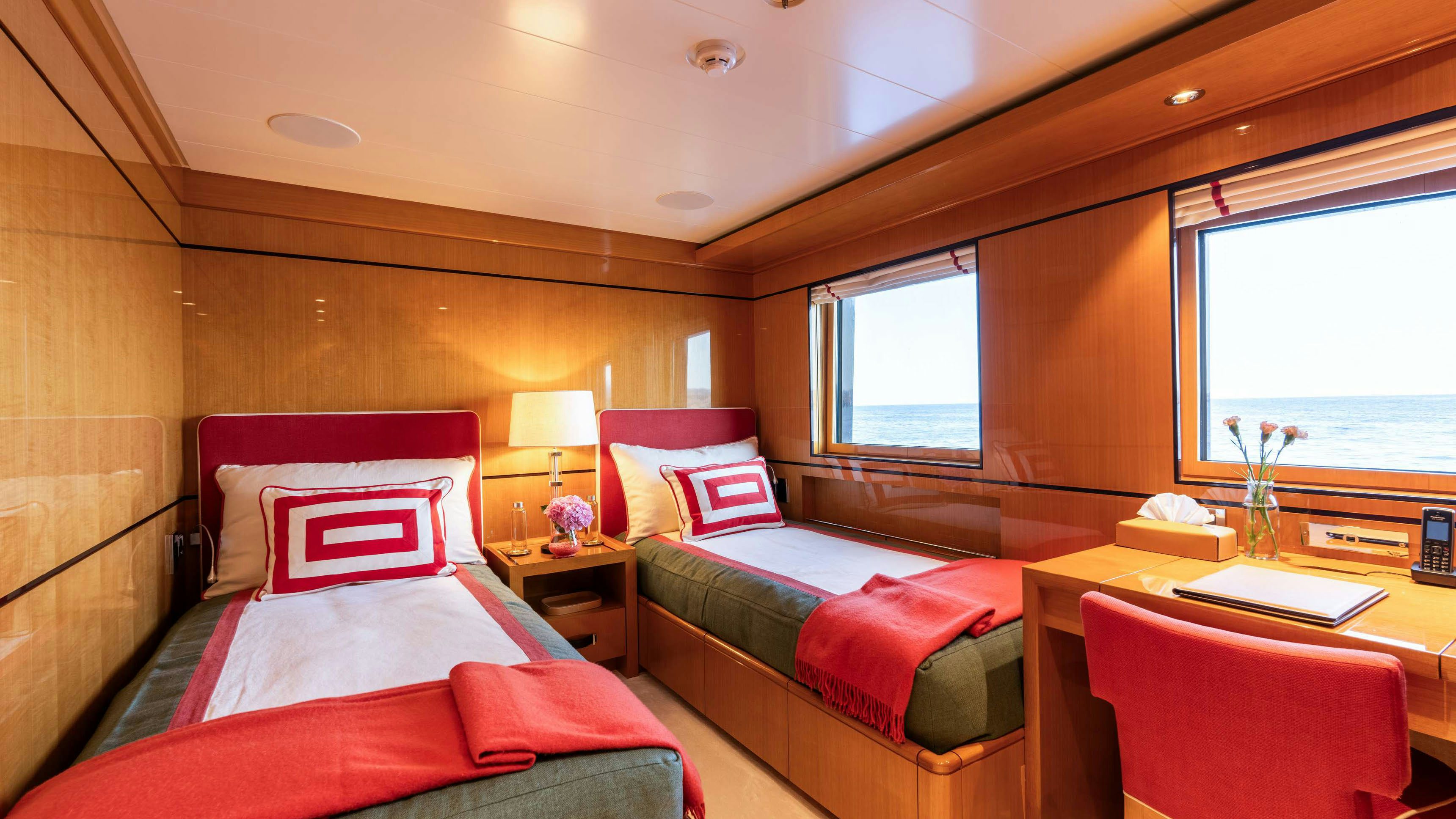a room with two beds aboard DEEP BLUE Yacht for Charter