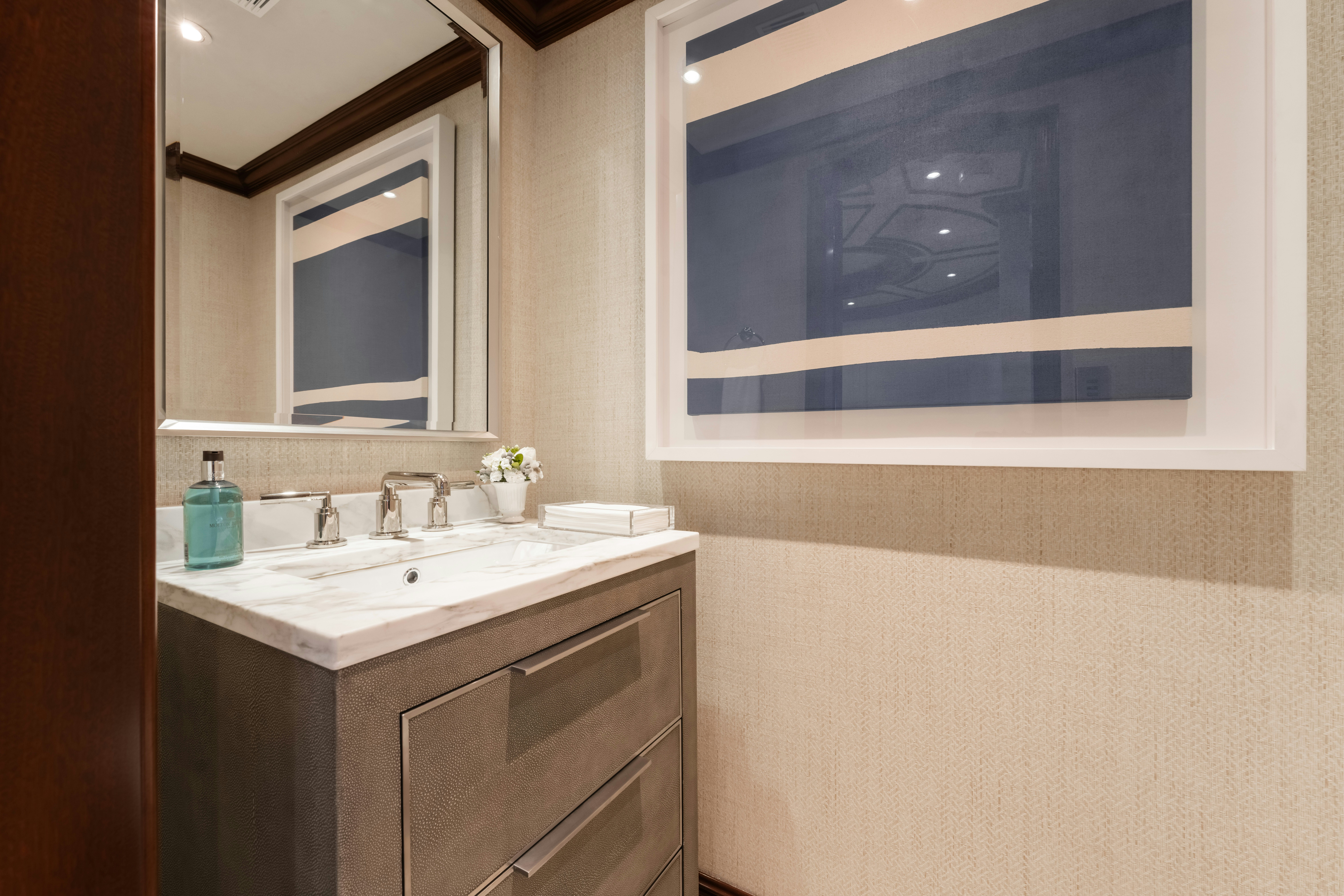 a bathroom with a large mirror aboard SUMMERDANCE Yacht for Sale