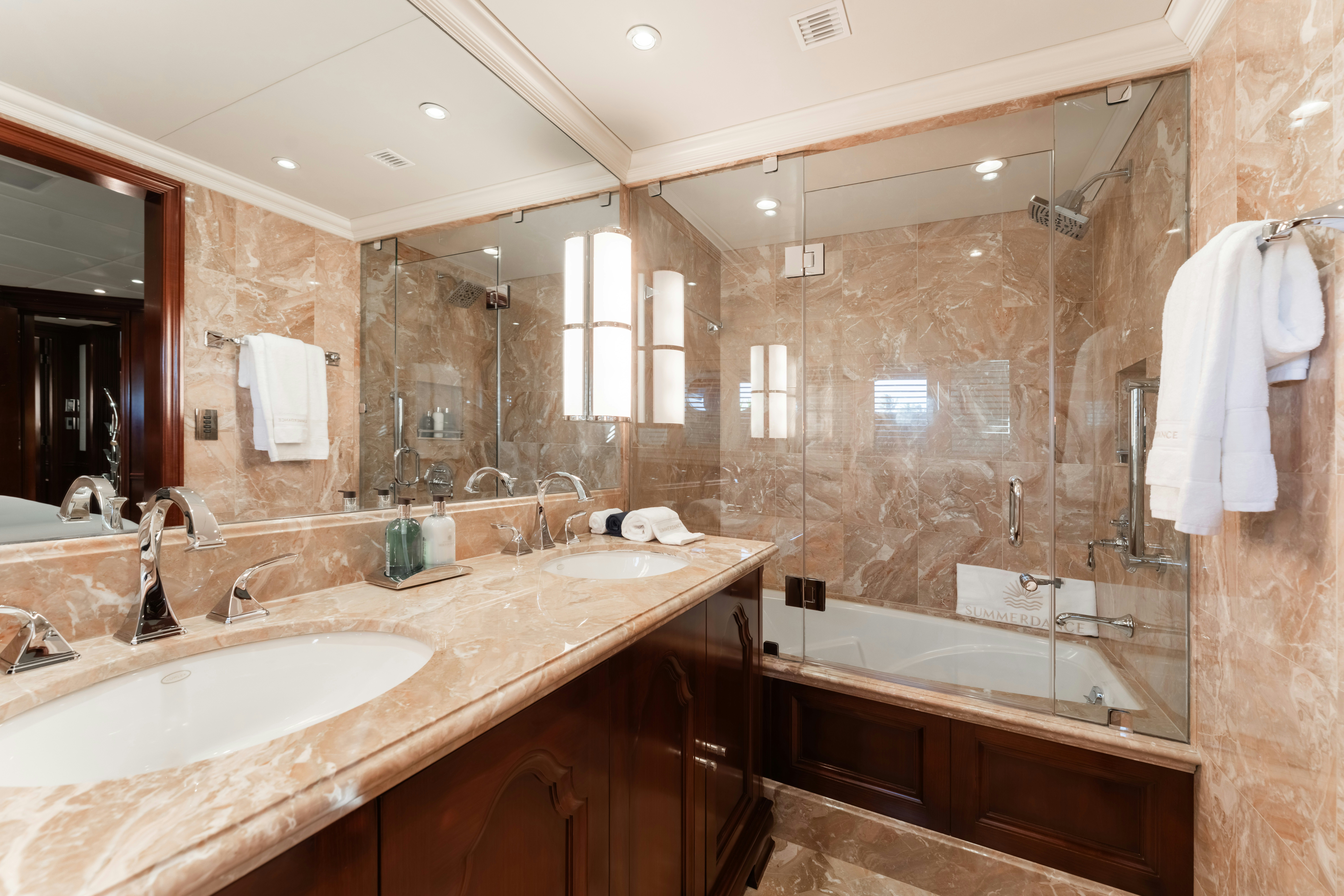 a bathroom with a large mirror aboard SUMMERDANCE Yacht for Sale
