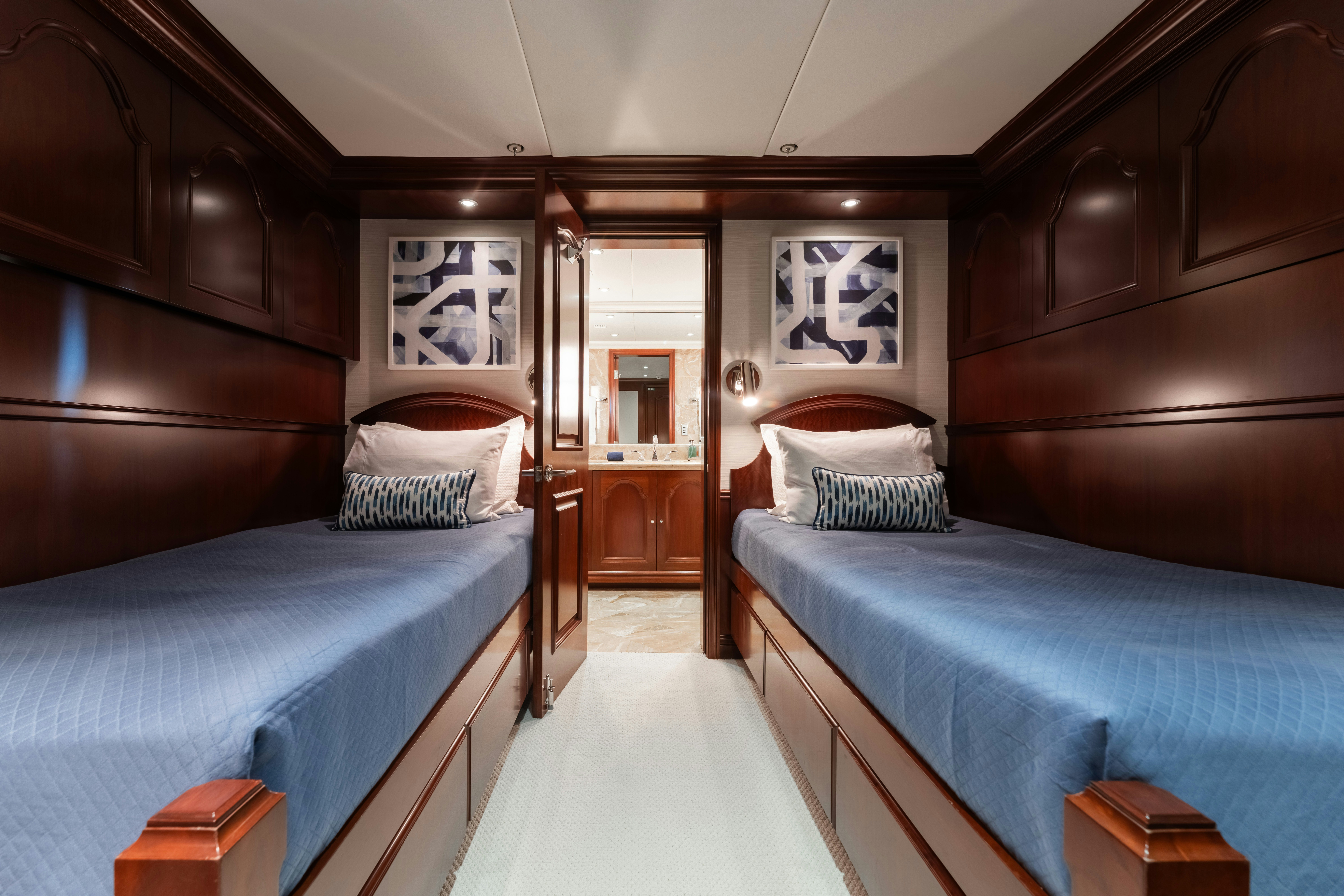 a couple of beds in a room aboard SUMMERDANCE Yacht for Sale