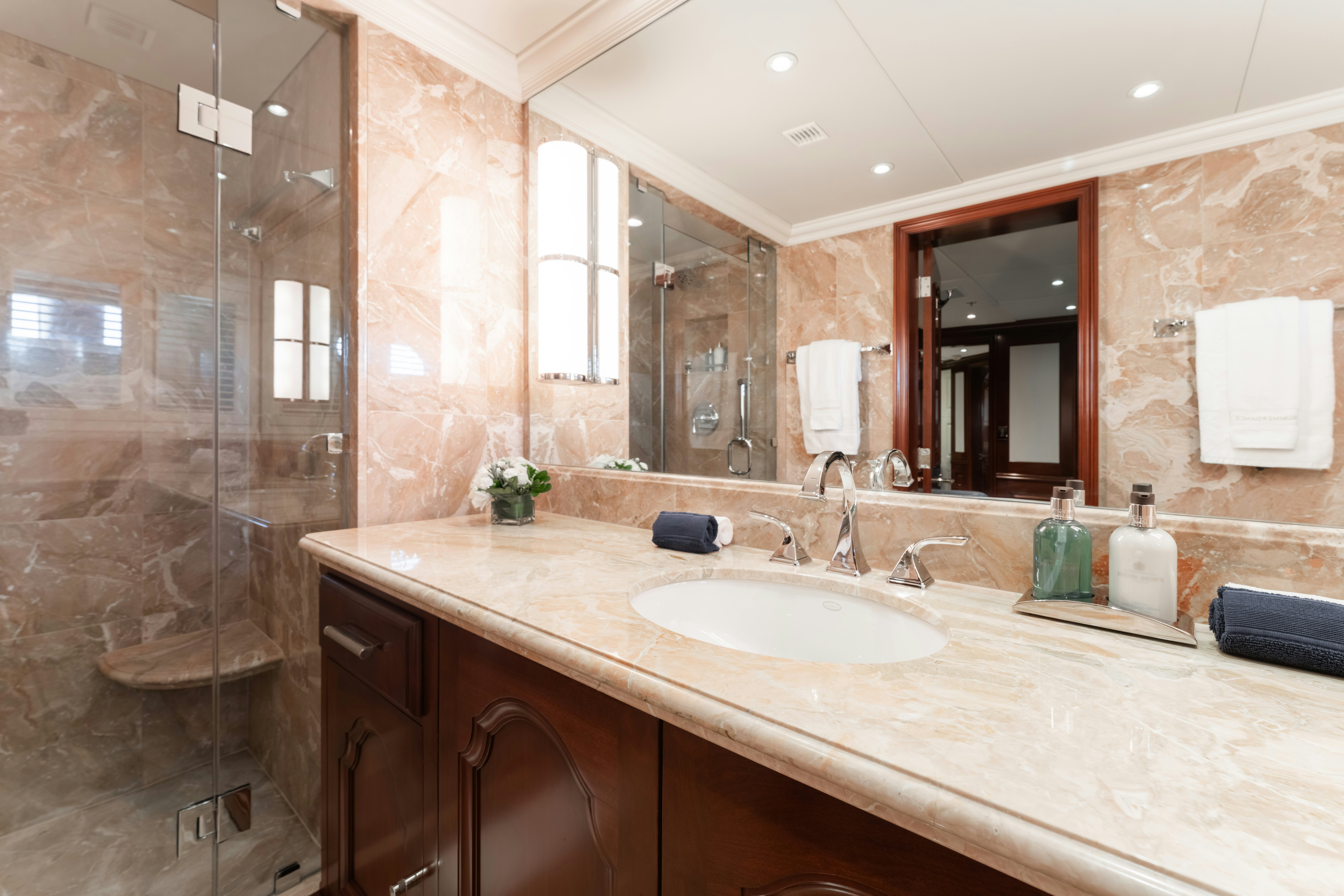 a bathroom with a large mirror aboard SUMMERDANCE Yacht for Sale