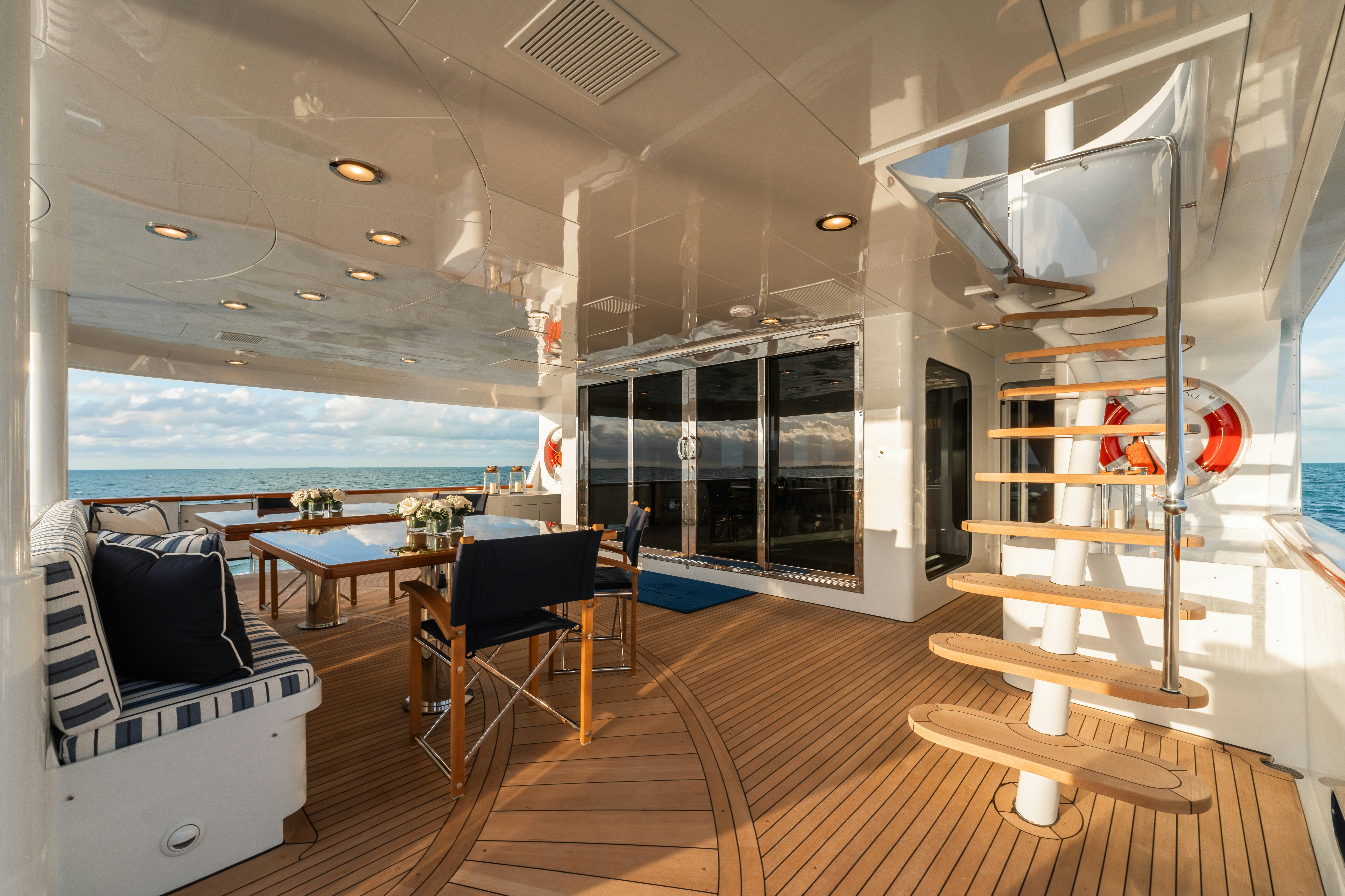 a room with a table and chairs aboard SUMMERDANCE Yacht for Sale