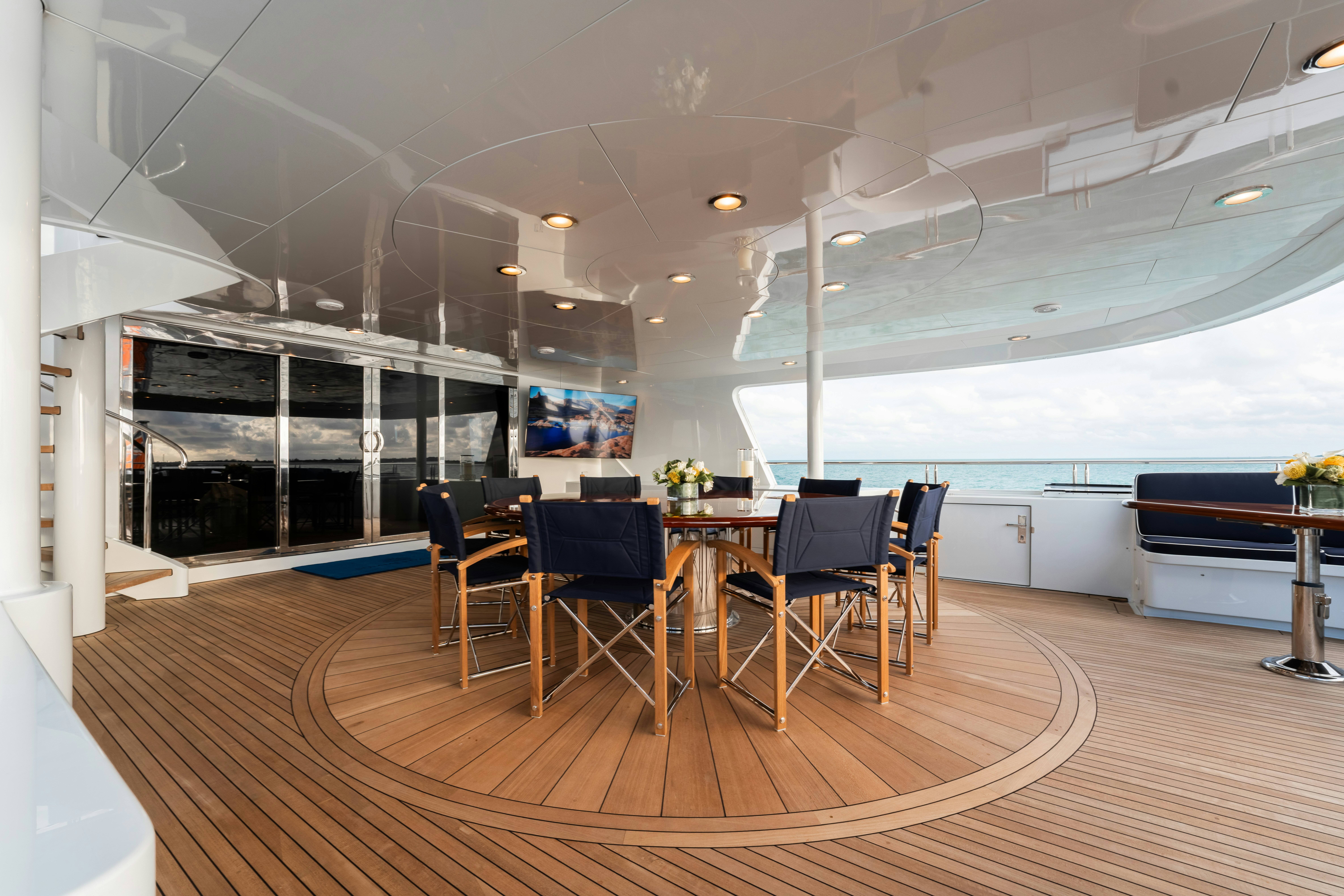 a room with a table and chairs aboard SUMMERDANCE Yacht for Sale