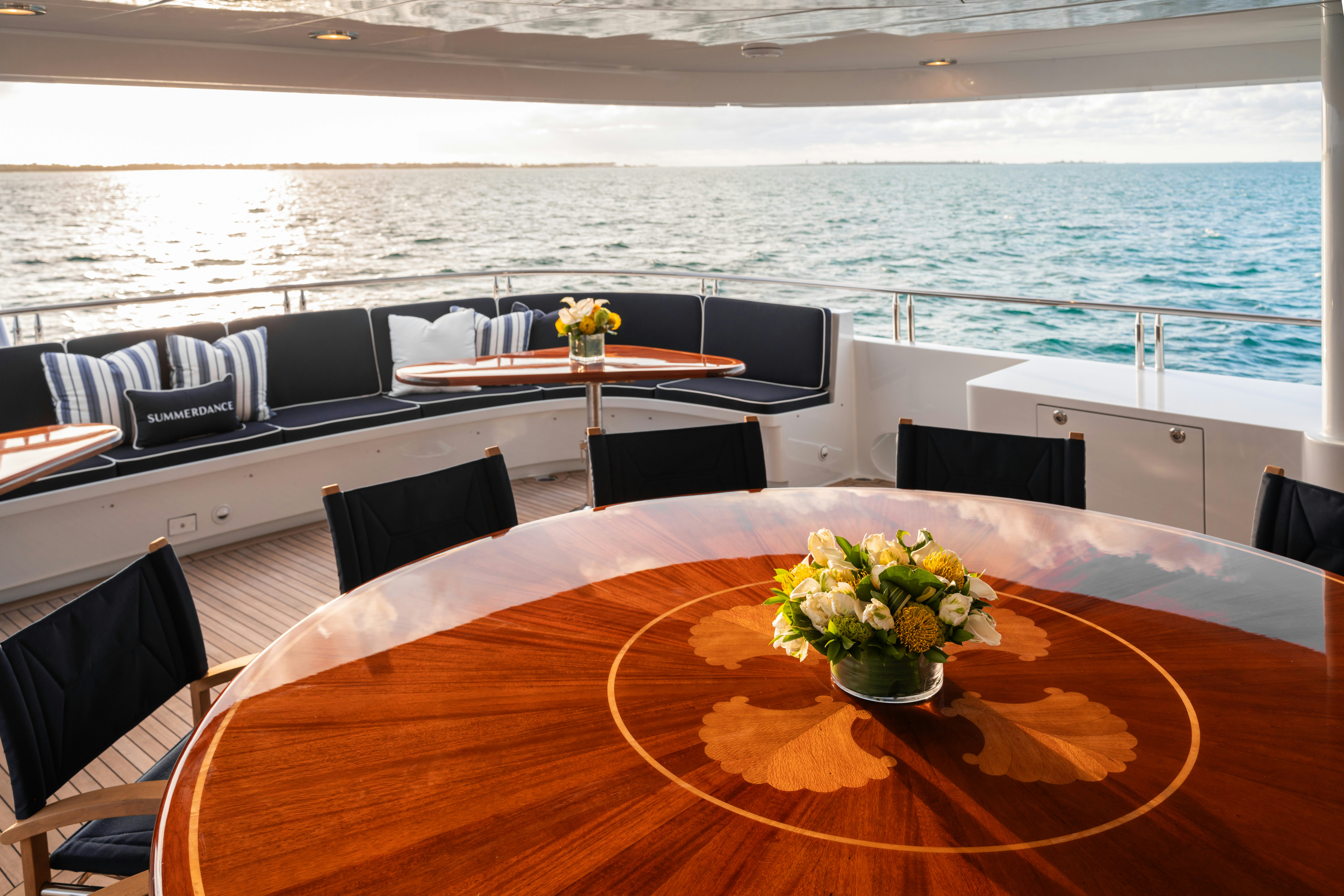 a table with flowers on it aboard SUMMERDANCE Yacht for Sale
