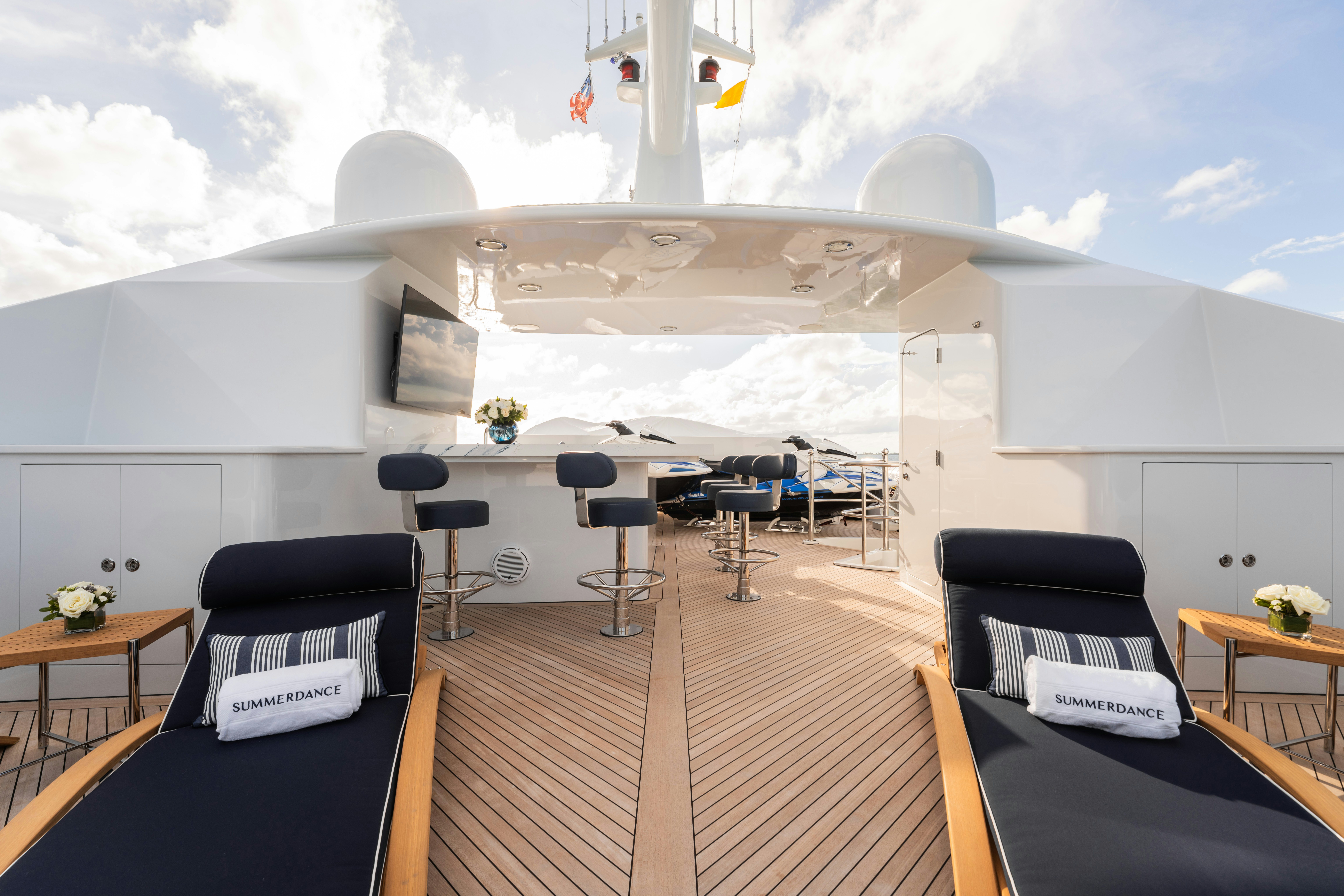 a room with a table and chairs aboard SUMMERDANCE Yacht for Sale
