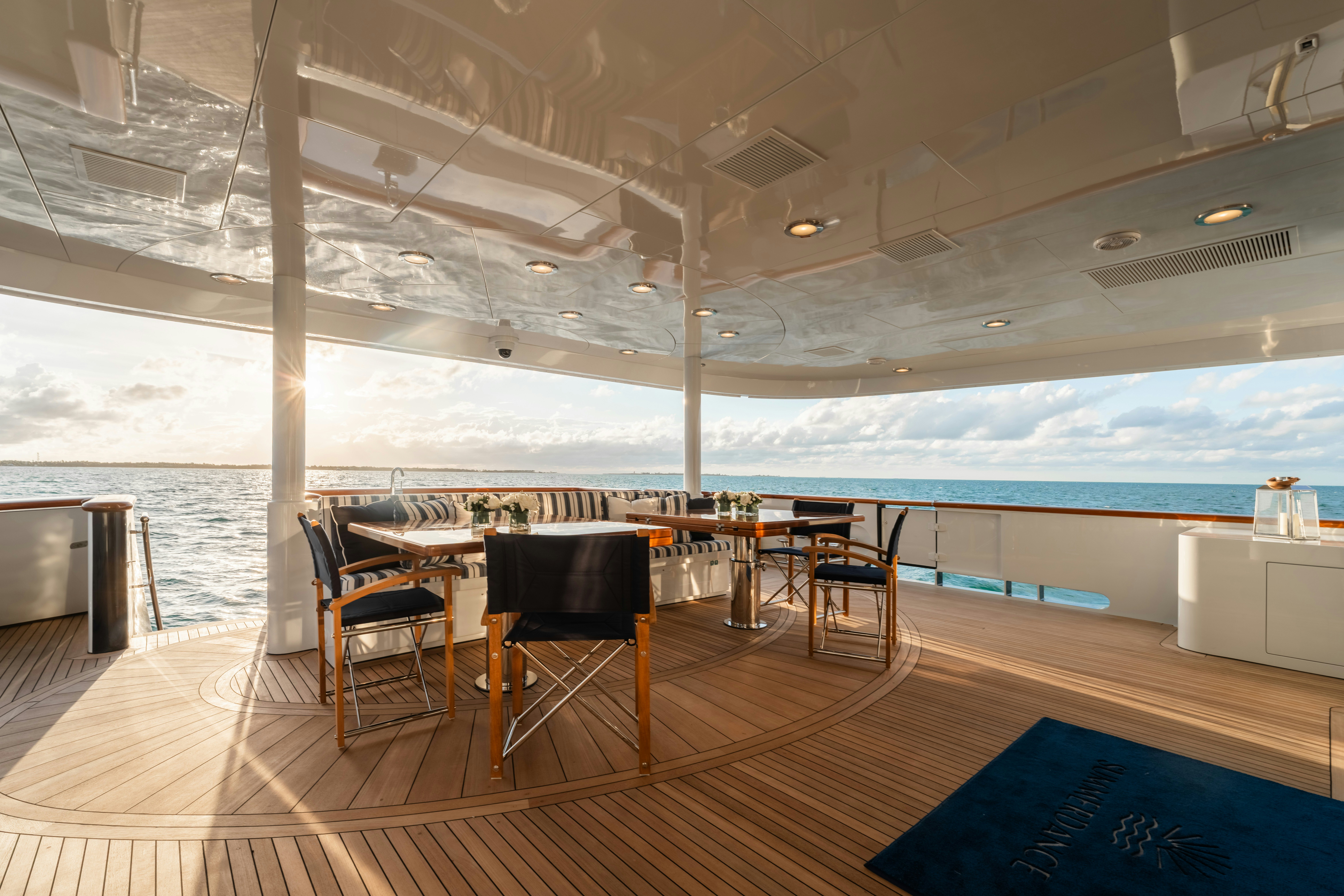 a room with a table and chairs aboard SUMMERDANCE Yacht for Charter