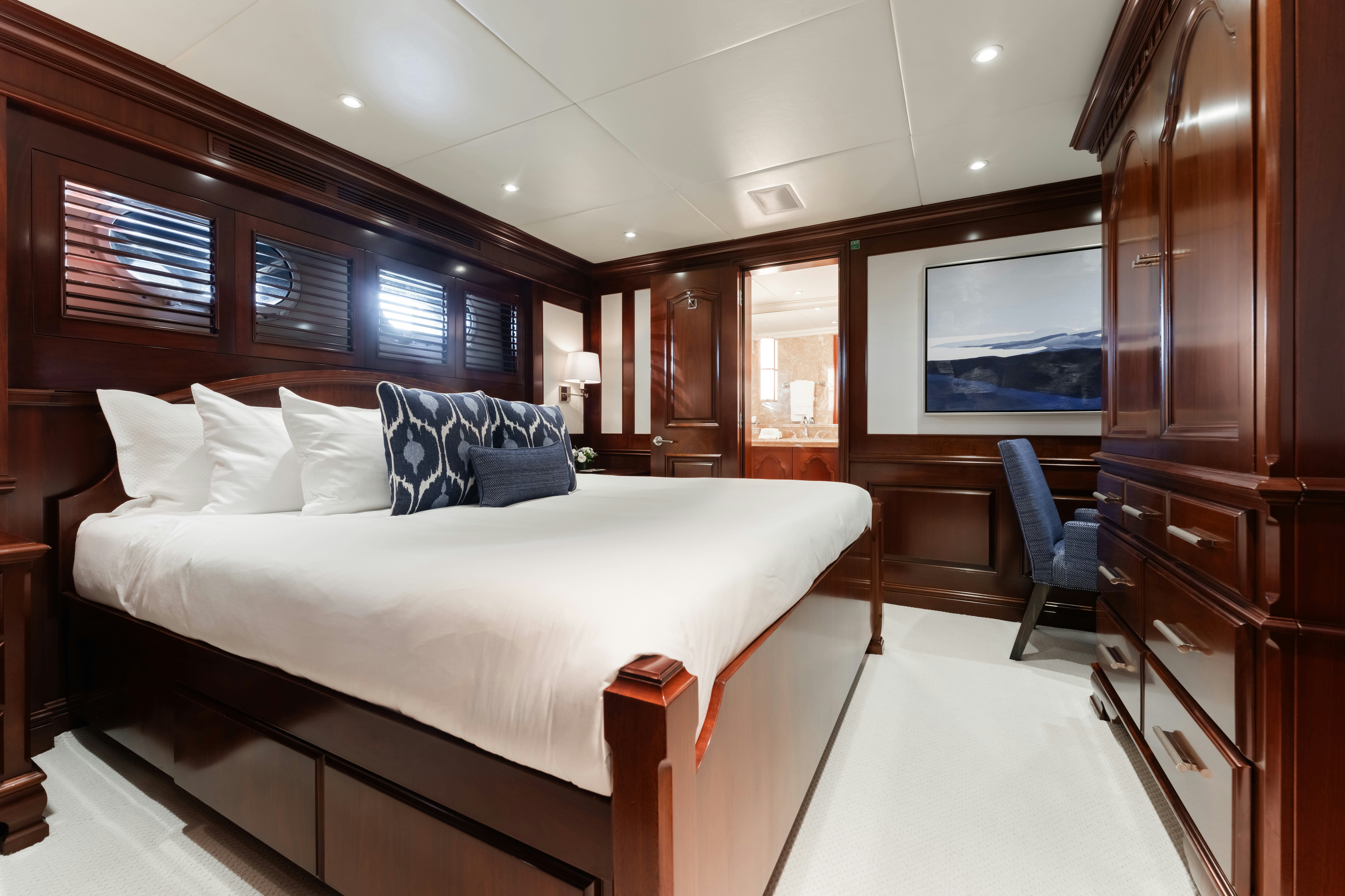 a bed in a room aboard SUMMERDANCE Yacht for Charter